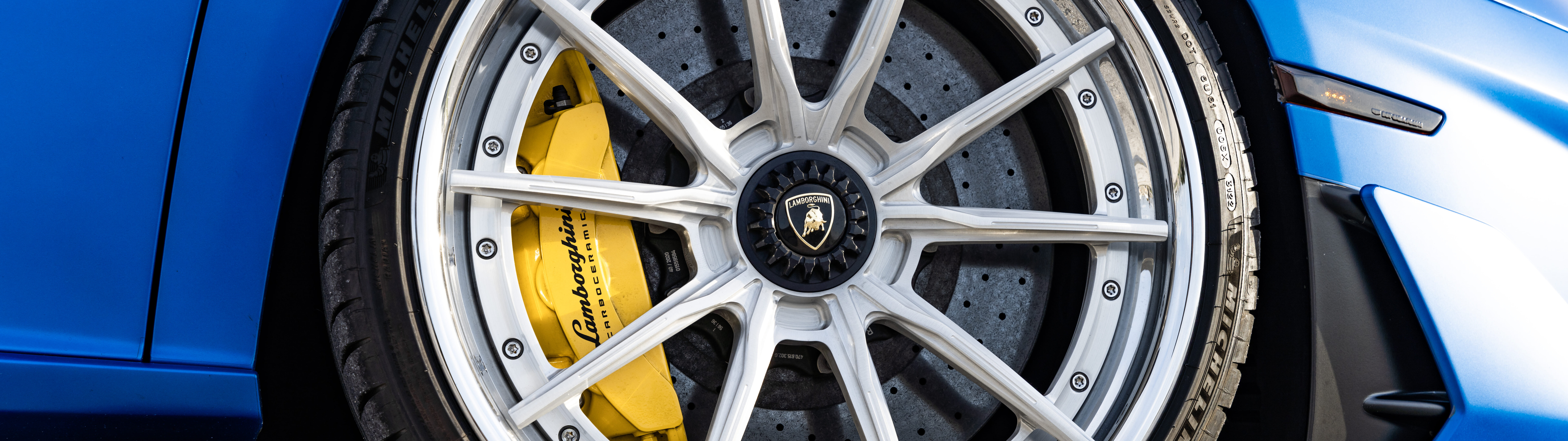 A high-performance Lamborghini Aventador SVJ supercar featuring sleek lines and aggressive aerodynamics.