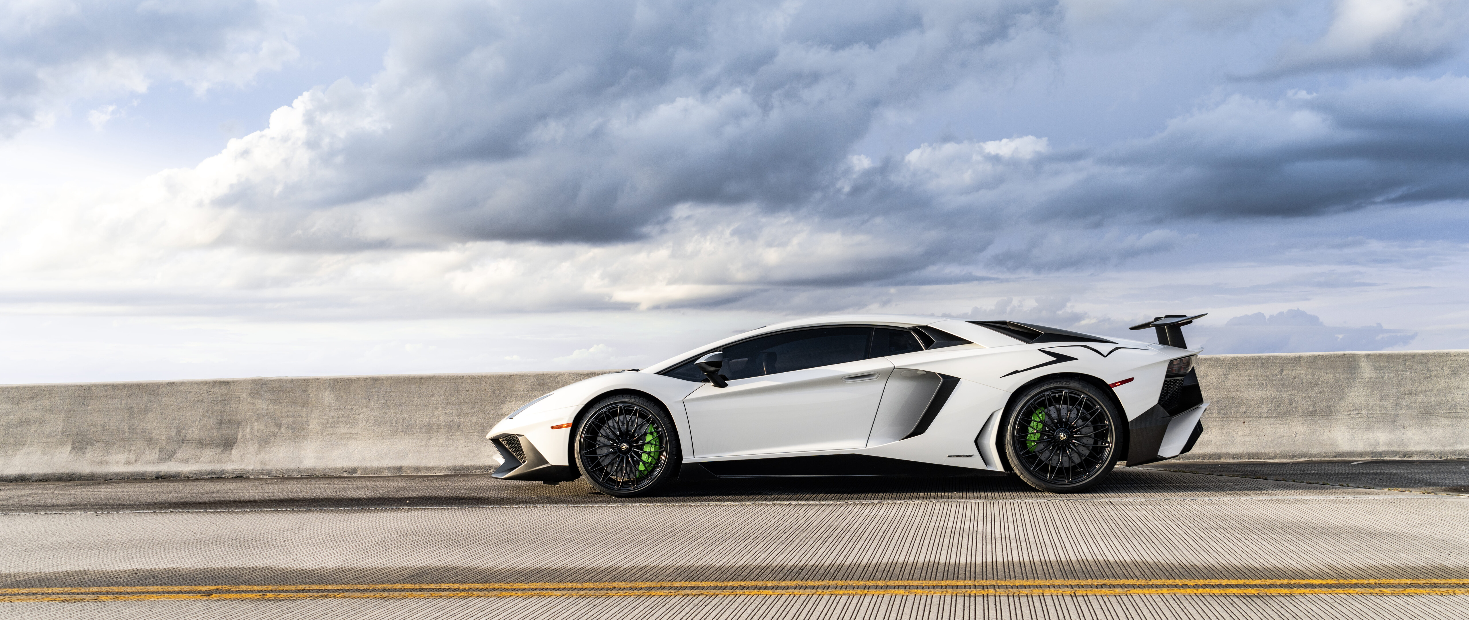 A sleek and powerful Lamborghini supercar featuring sharp lines and a high-gloss aerodynamic body.