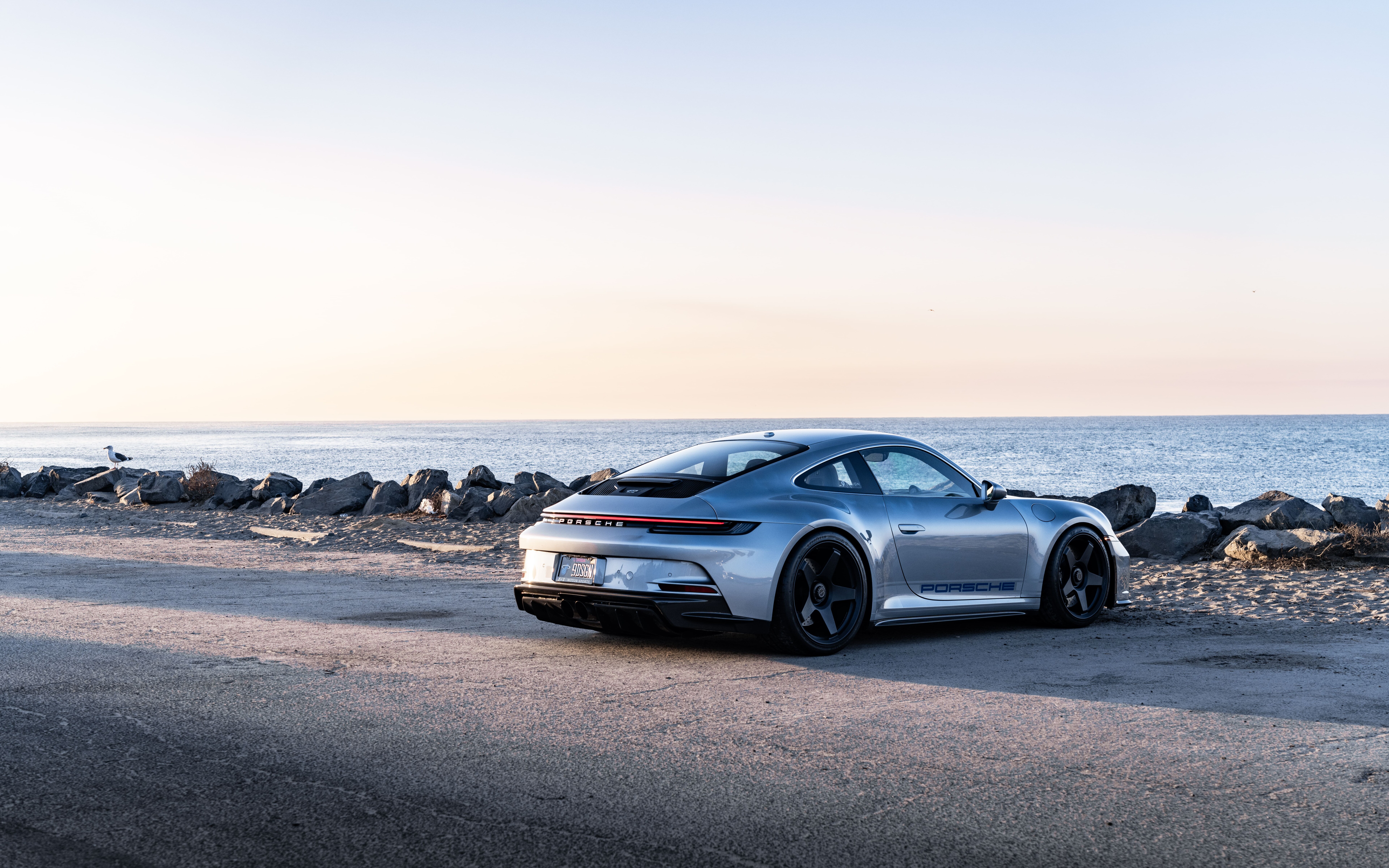 A high-performance Porsche GT3 RS sports car featuring aerodynamic styling.