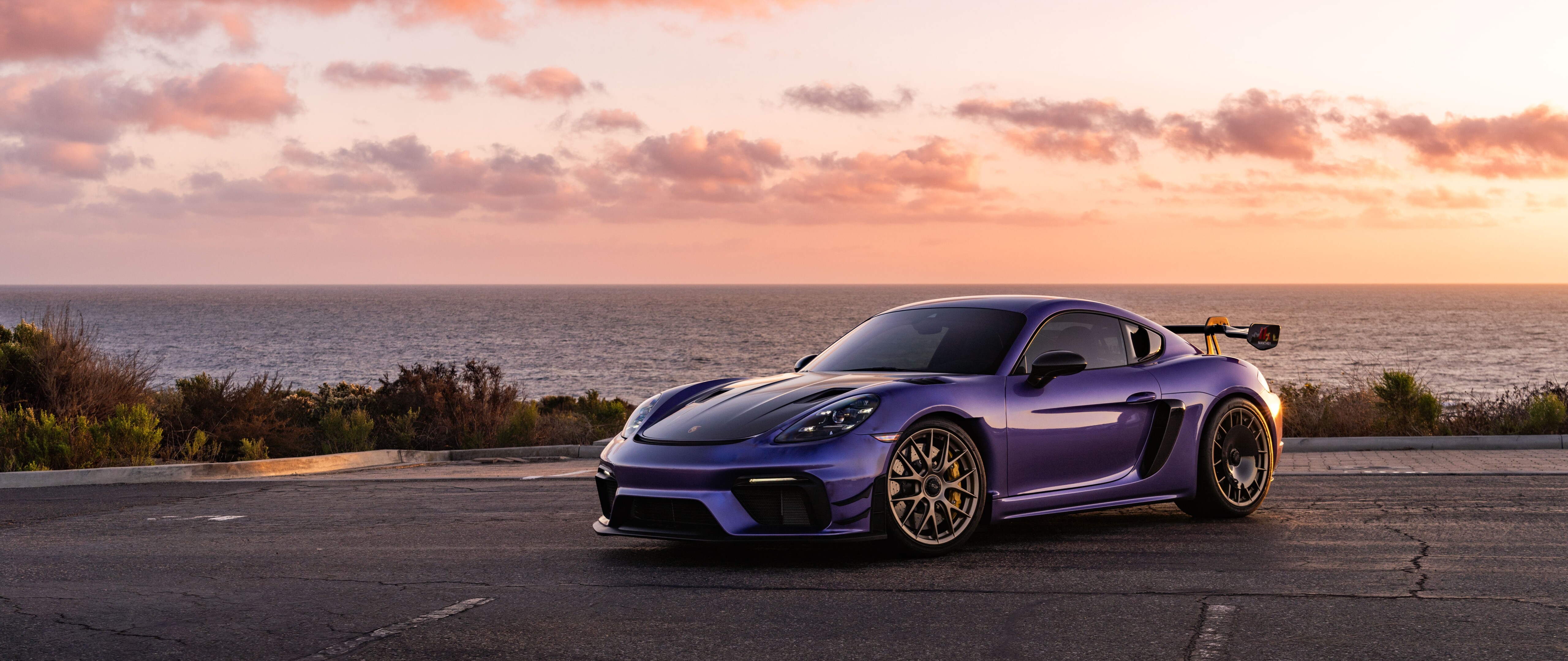 A sleek and powerful Porsche GT3 RS sports car featuring aggressive aerodynamic bodywork.