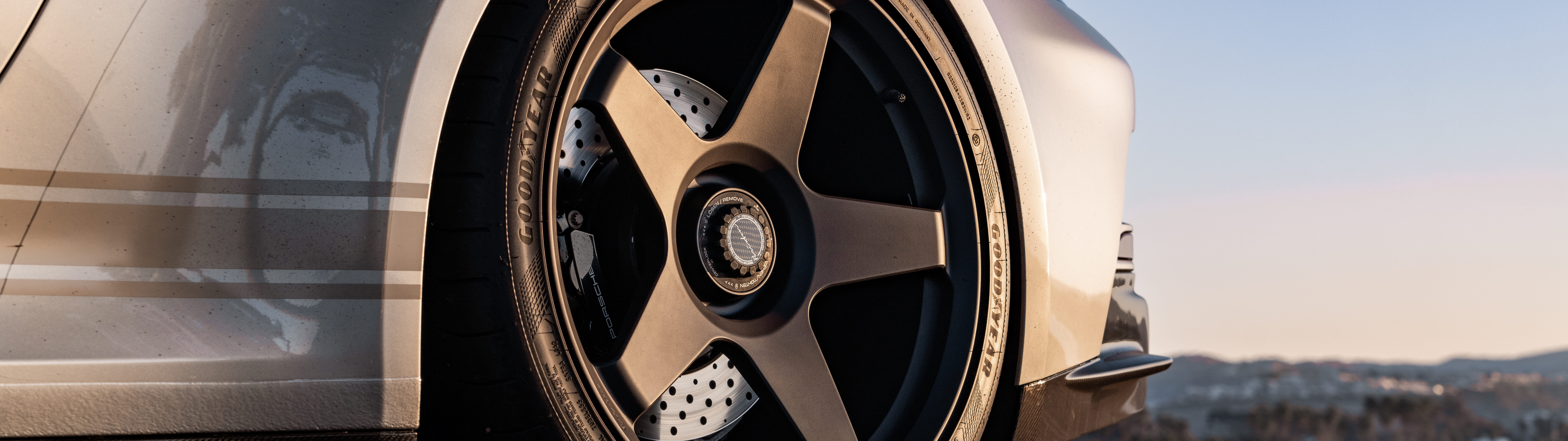 A high-performance Porsche GT3 RS sports car featuring aggressive aerodynamic styling.