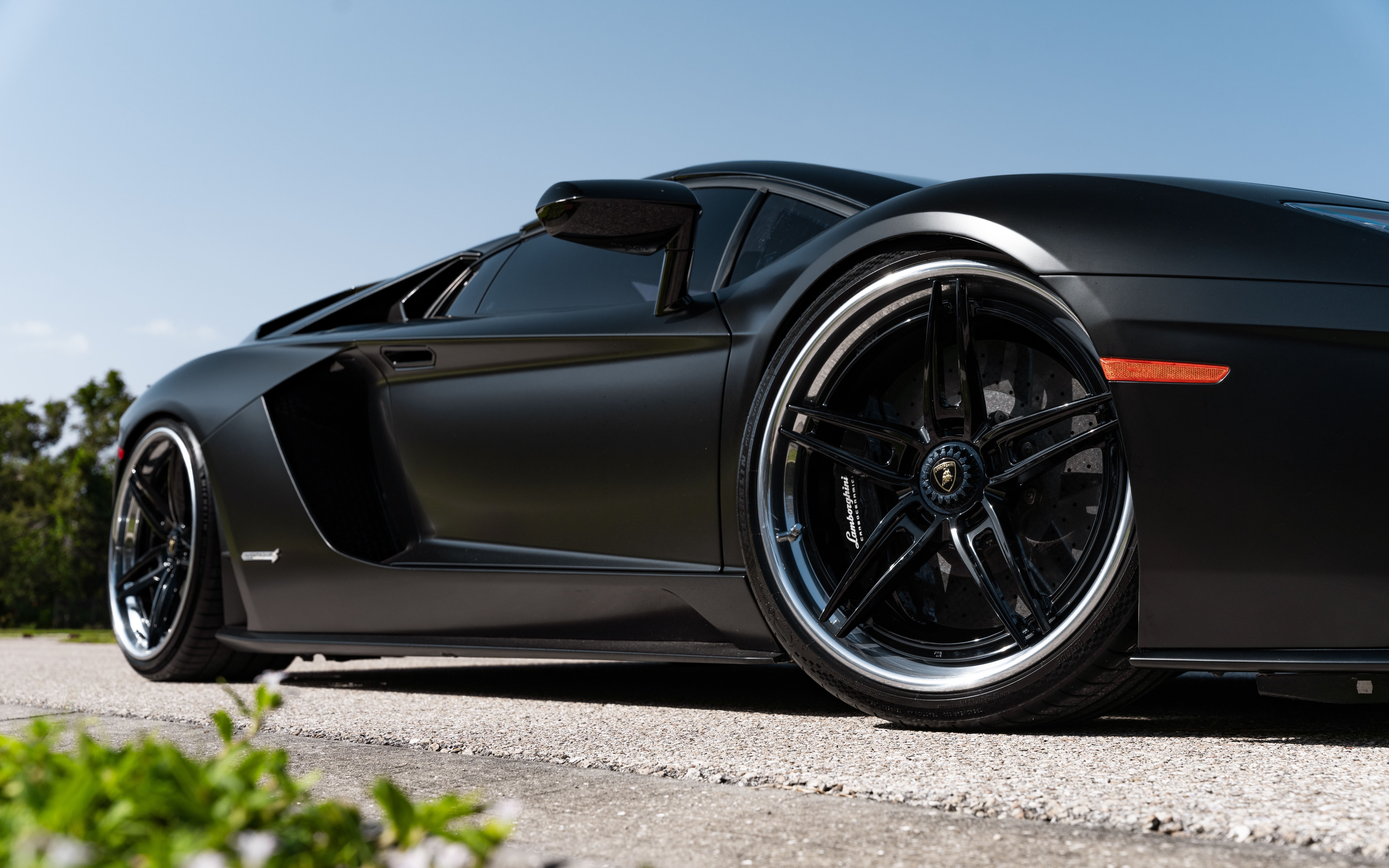 A high-resolution shot of a luxury Lamborghini supercar with a sleek, aerodynamic design and polished exterior.