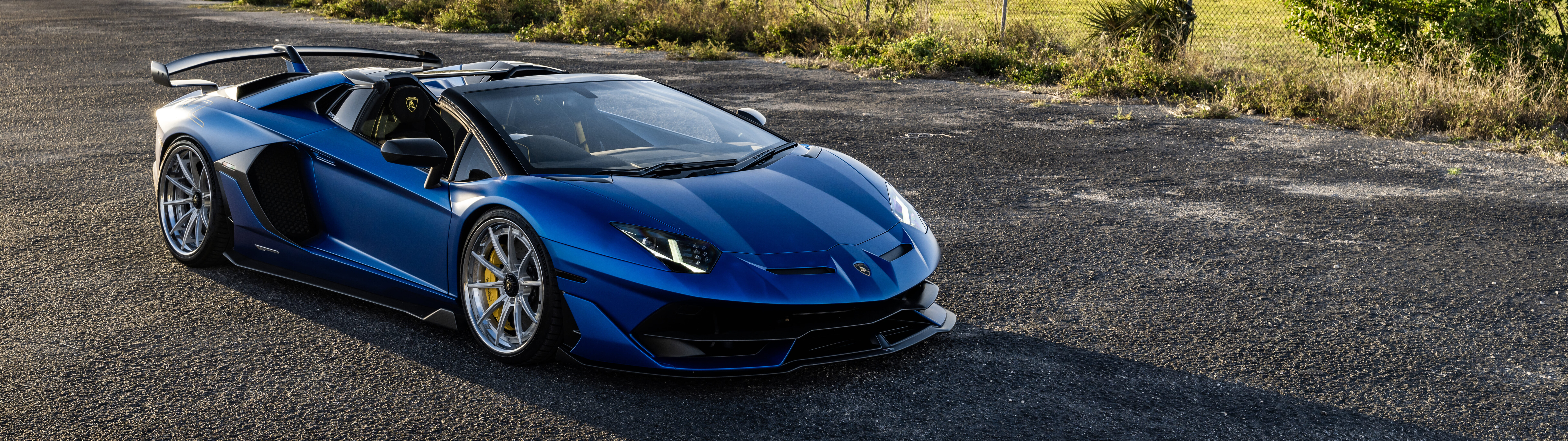 A high-performance Lamborghini supercar featuring iconic aerodynamic curves and a polished, luxurious finish.