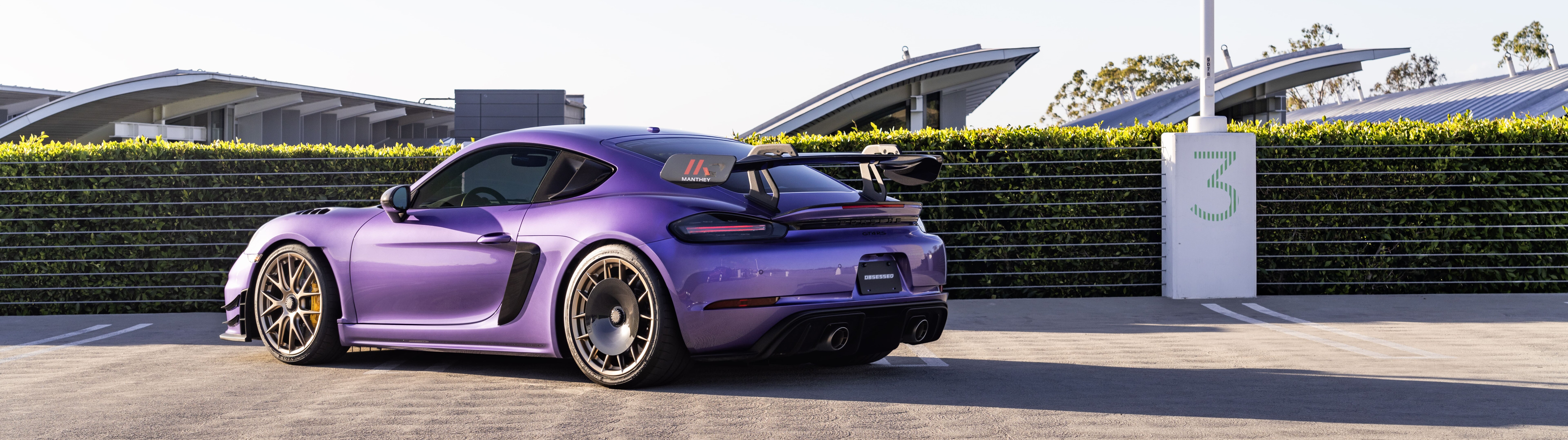 A high-performance Porsche GT3 RS sports car featuring aggressive aerodynamic styling.