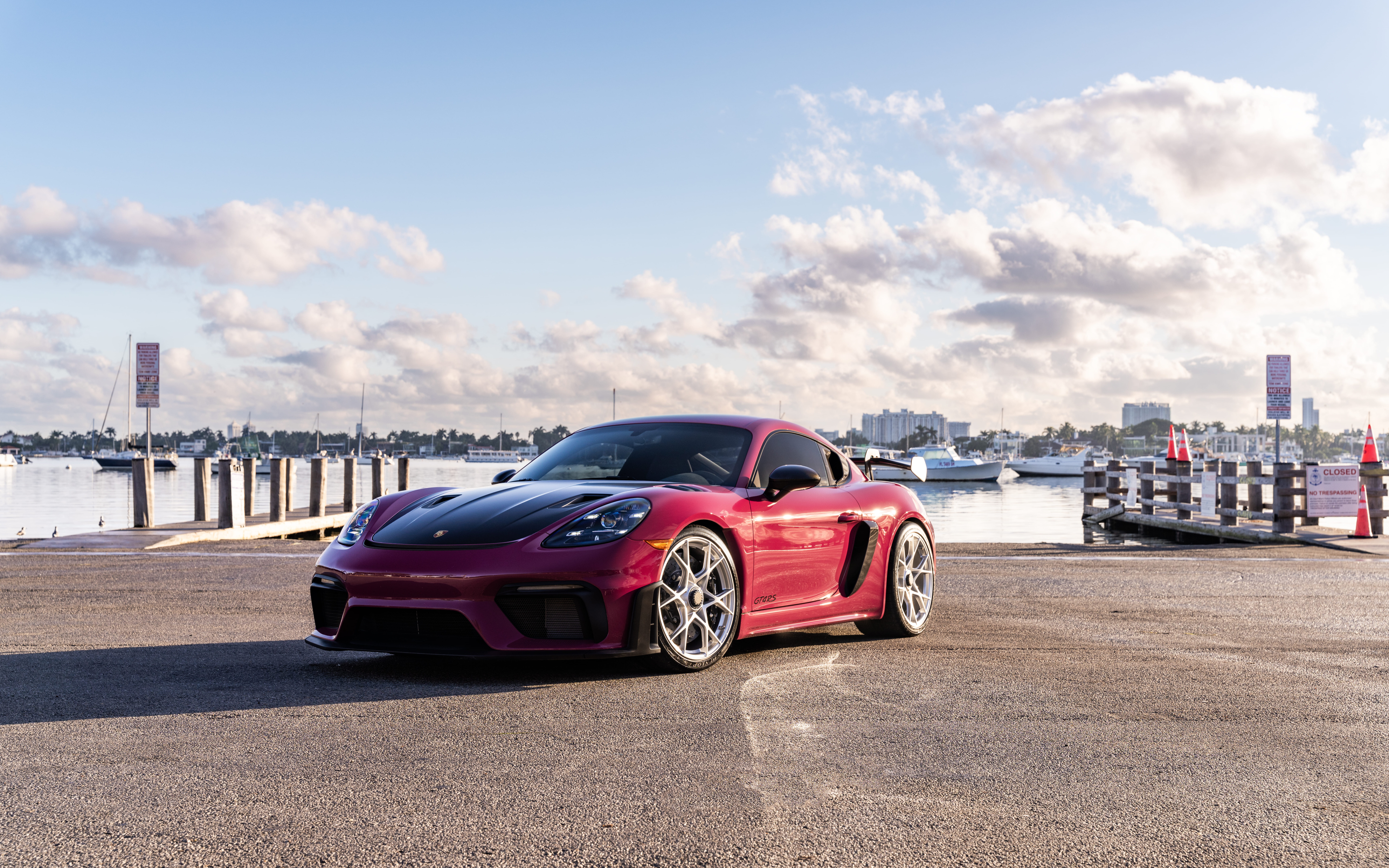 A close-up view of a high-performance Porsche sports car showcasing its luxurious design and polished exterior.
