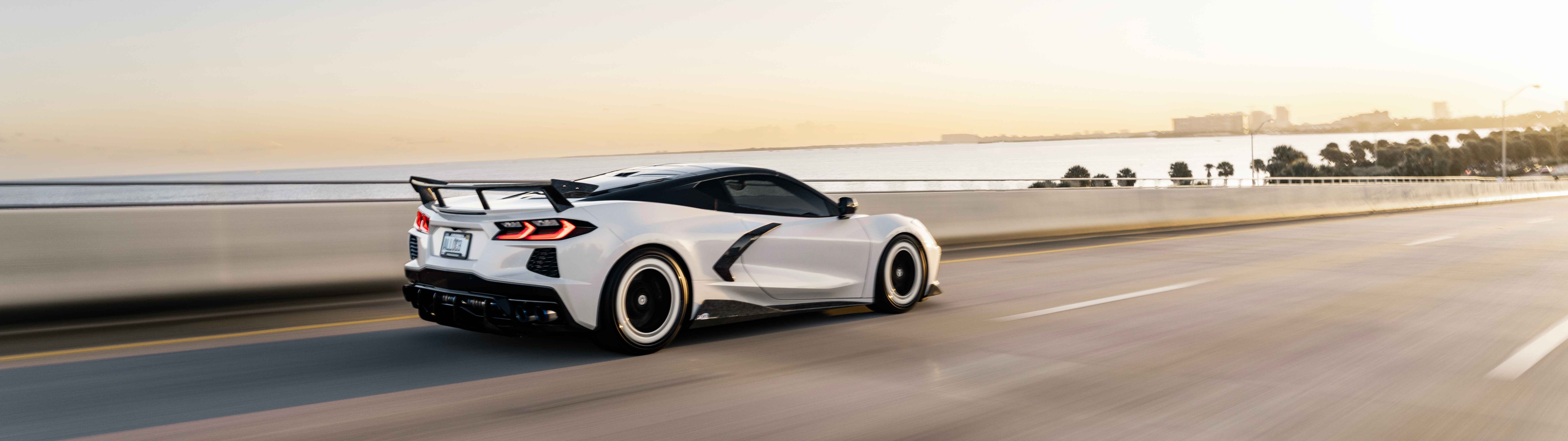 A high-performance Chevrolet Corvette C8 sports car with sleek, aerodynamic lines and a modern design.