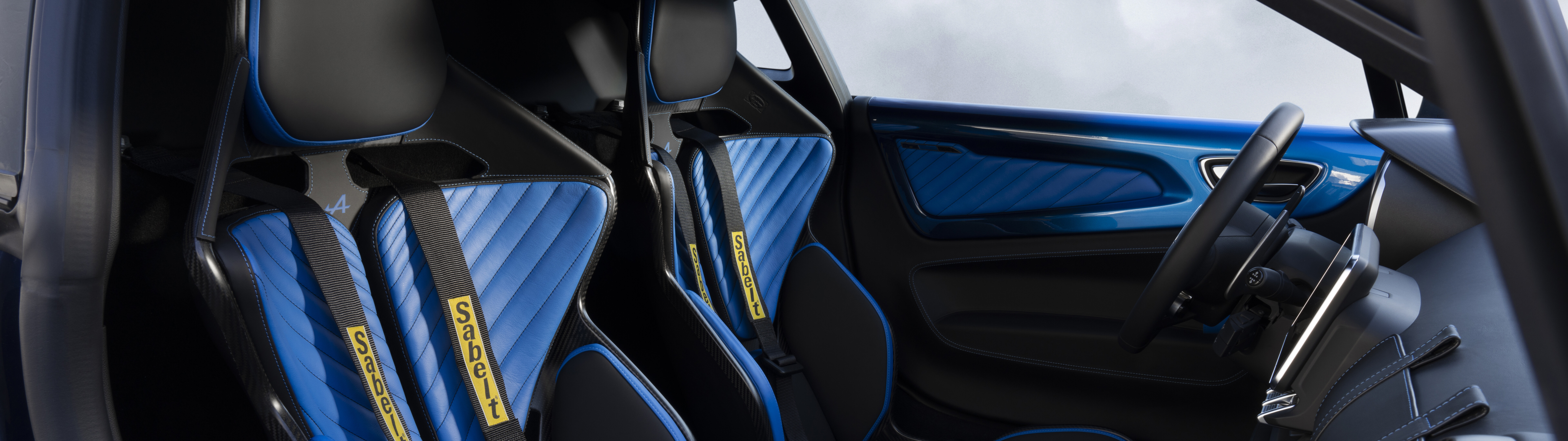 Detailed view of the interior cockpit of an Alpine A110 R Ultime sports car.