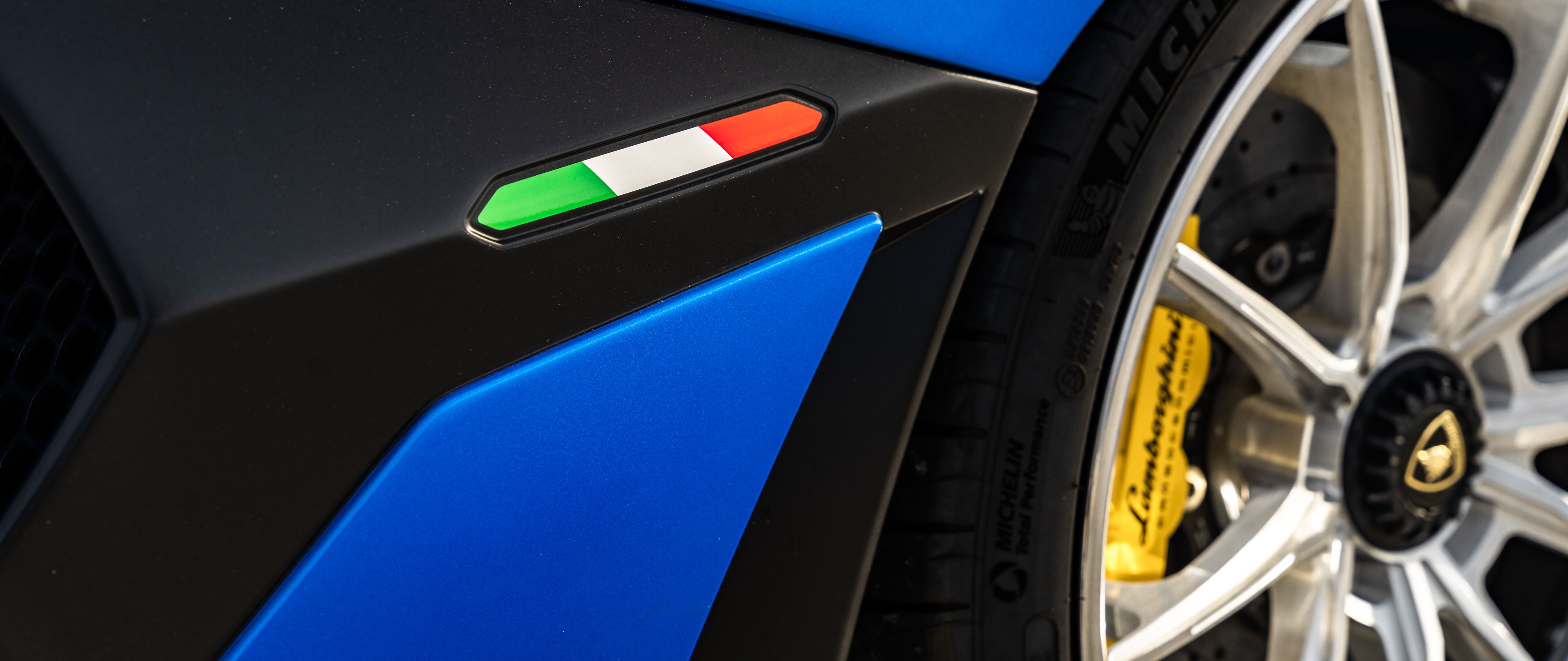 A high-performance Lamborghini Aventador SVJ supercar displaying its aerodynamic bodywork.