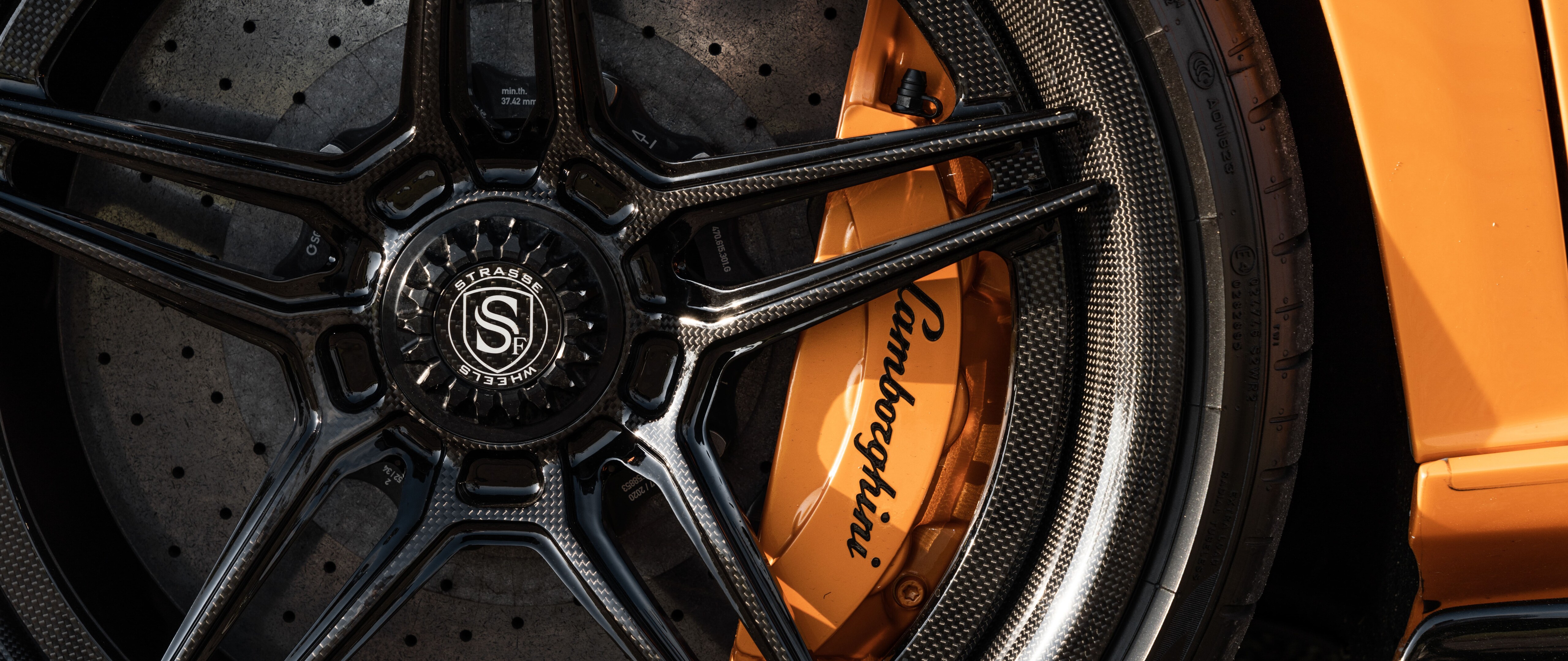 A high-performance Lamborghini Aventador SVJ supercar in a dynamic setting.