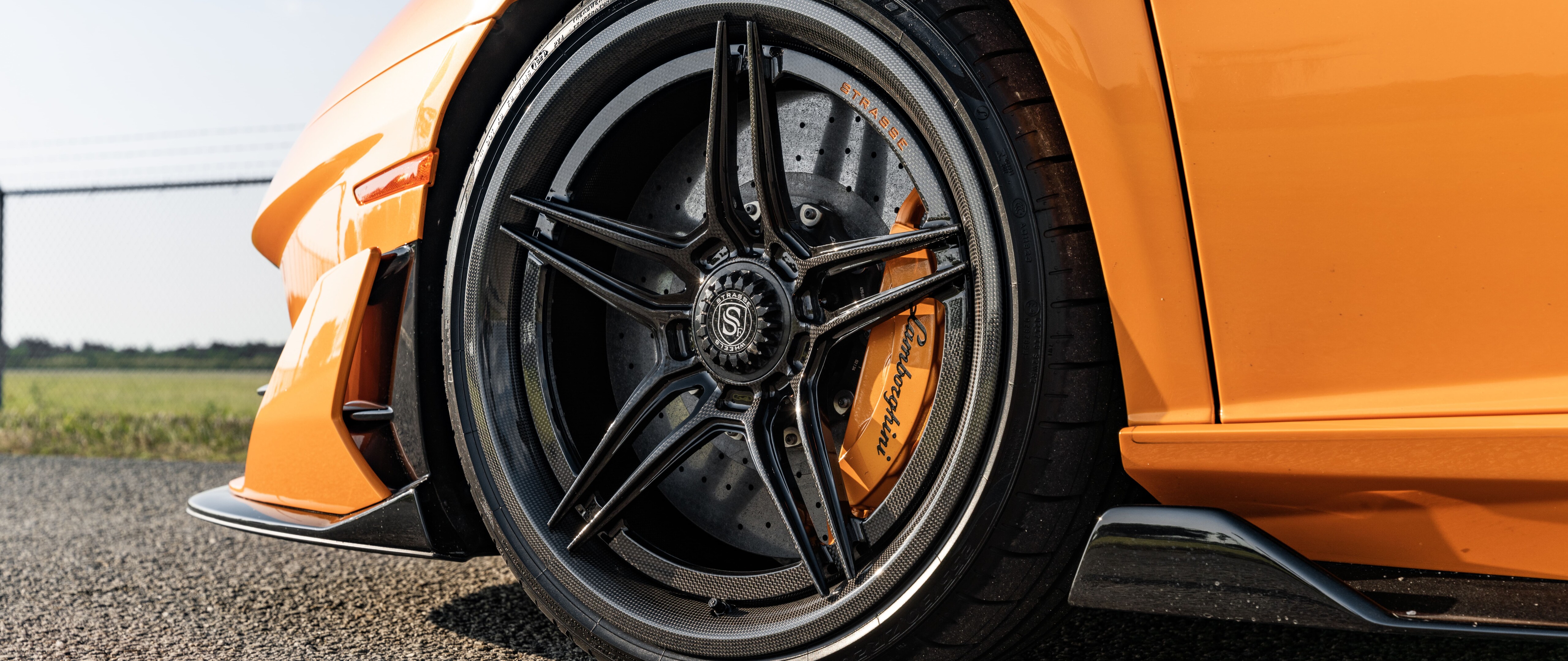 A high-performance Lamborghini Aventador SVJ supercar featuring its iconic aerodynamic body and aggressive styling.