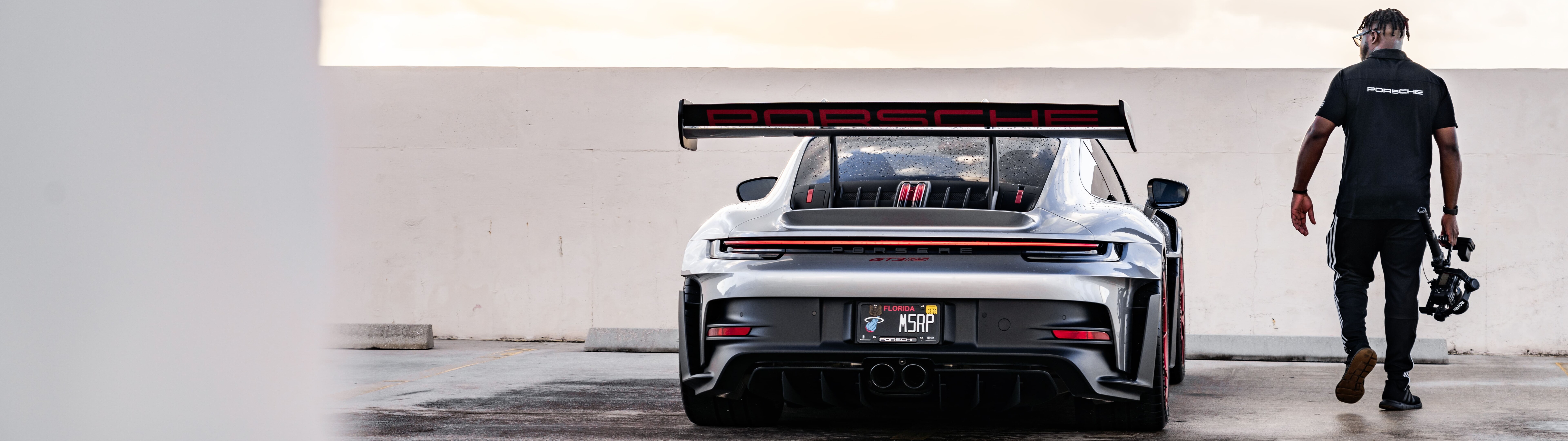 A detailed view of a sleek, high-performance Porsche GT3 RS sports car.
