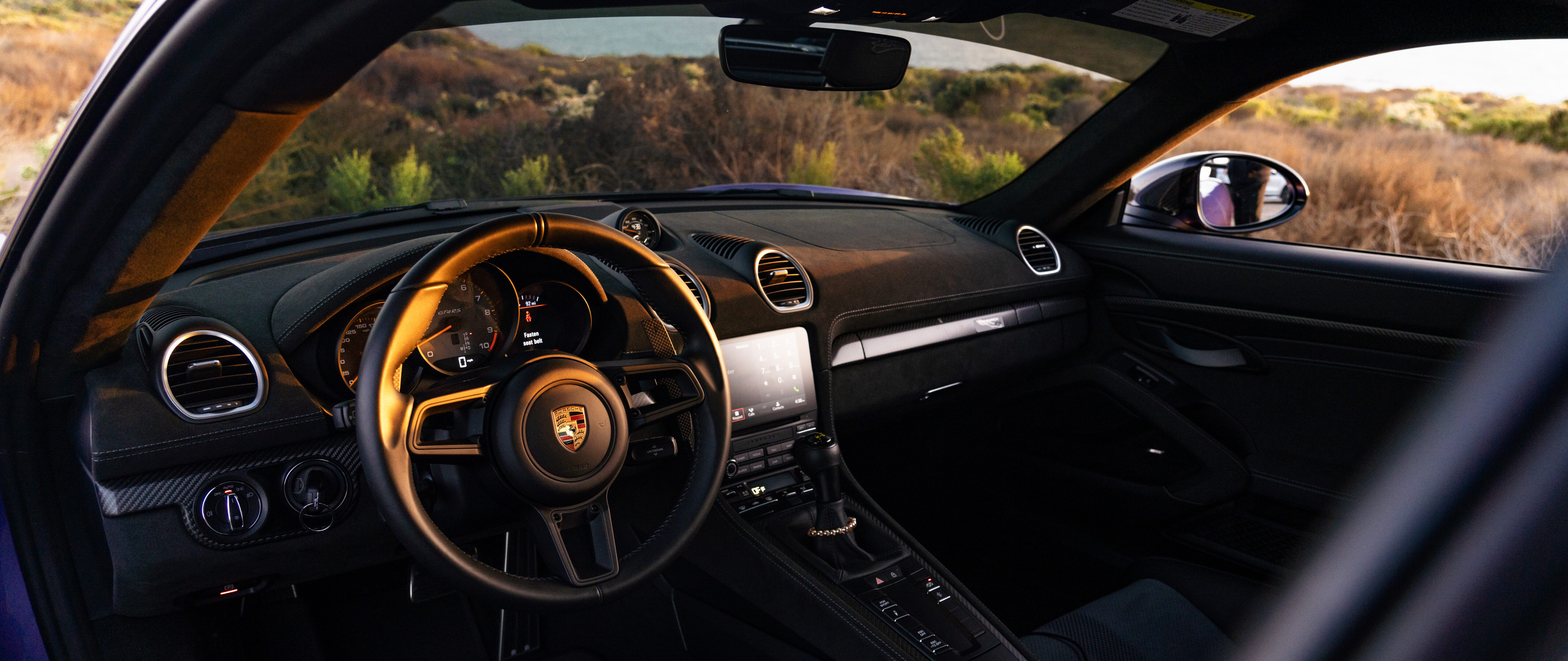 A sleek and powerful Porsche GT3 RS sports car showcasing its aerodynamic design.