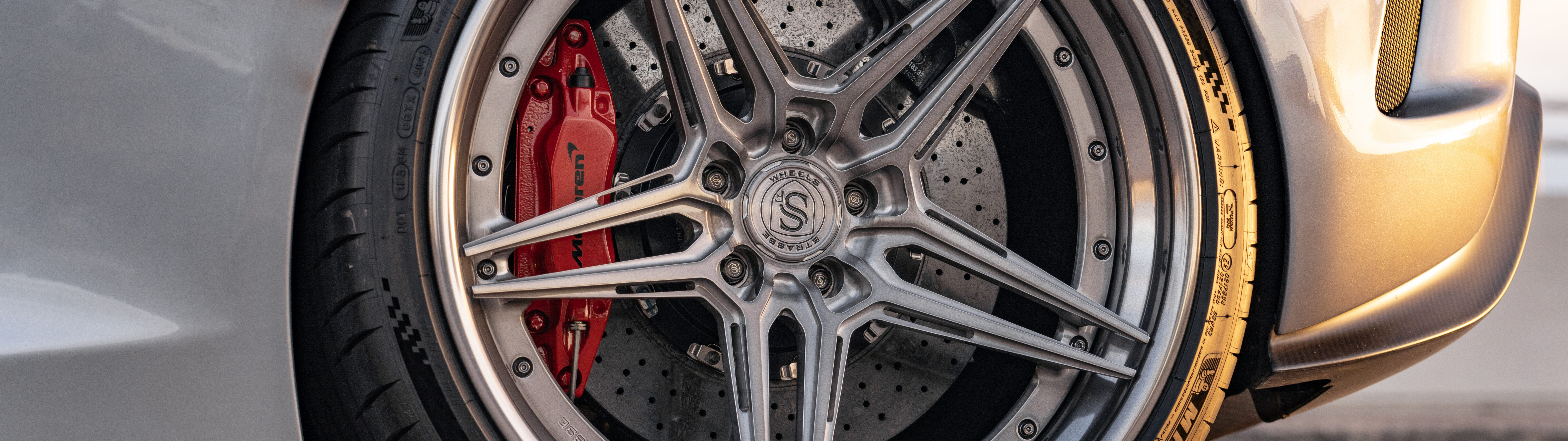 A high-performance McLaren supercar featuring sleek aerodynamic lines and a modern design.