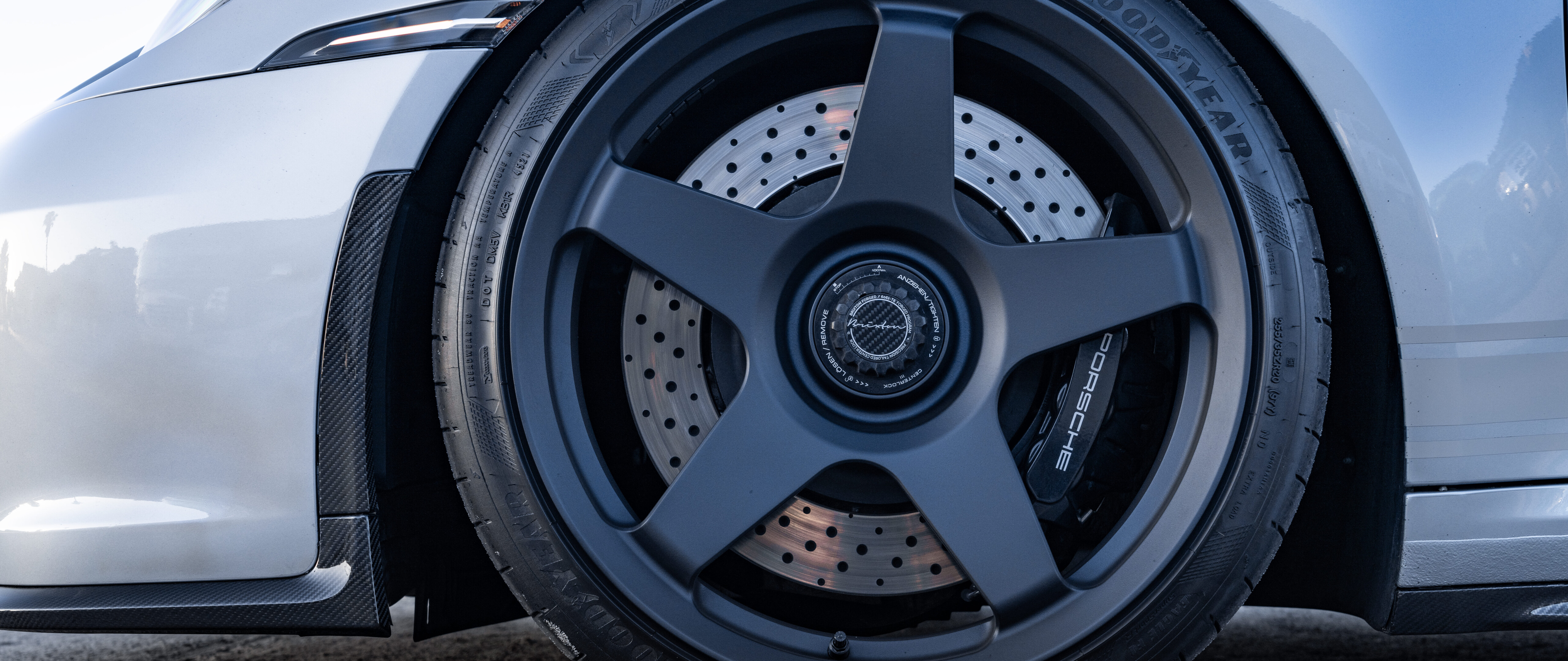 A detailed shot of a high-performance Porsche GT3 RS sports car.