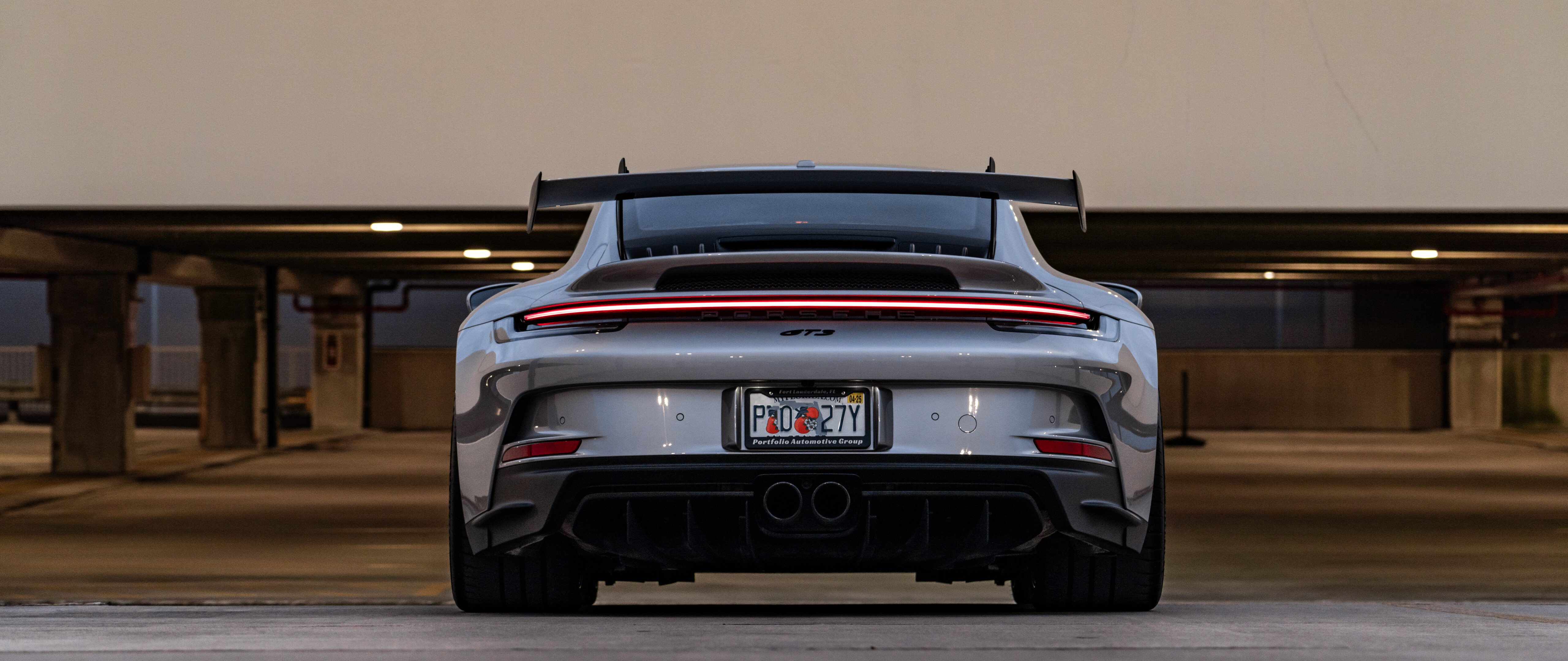 A detailed close-up of a high-performance Porsche 911 GT3 RS sports car.