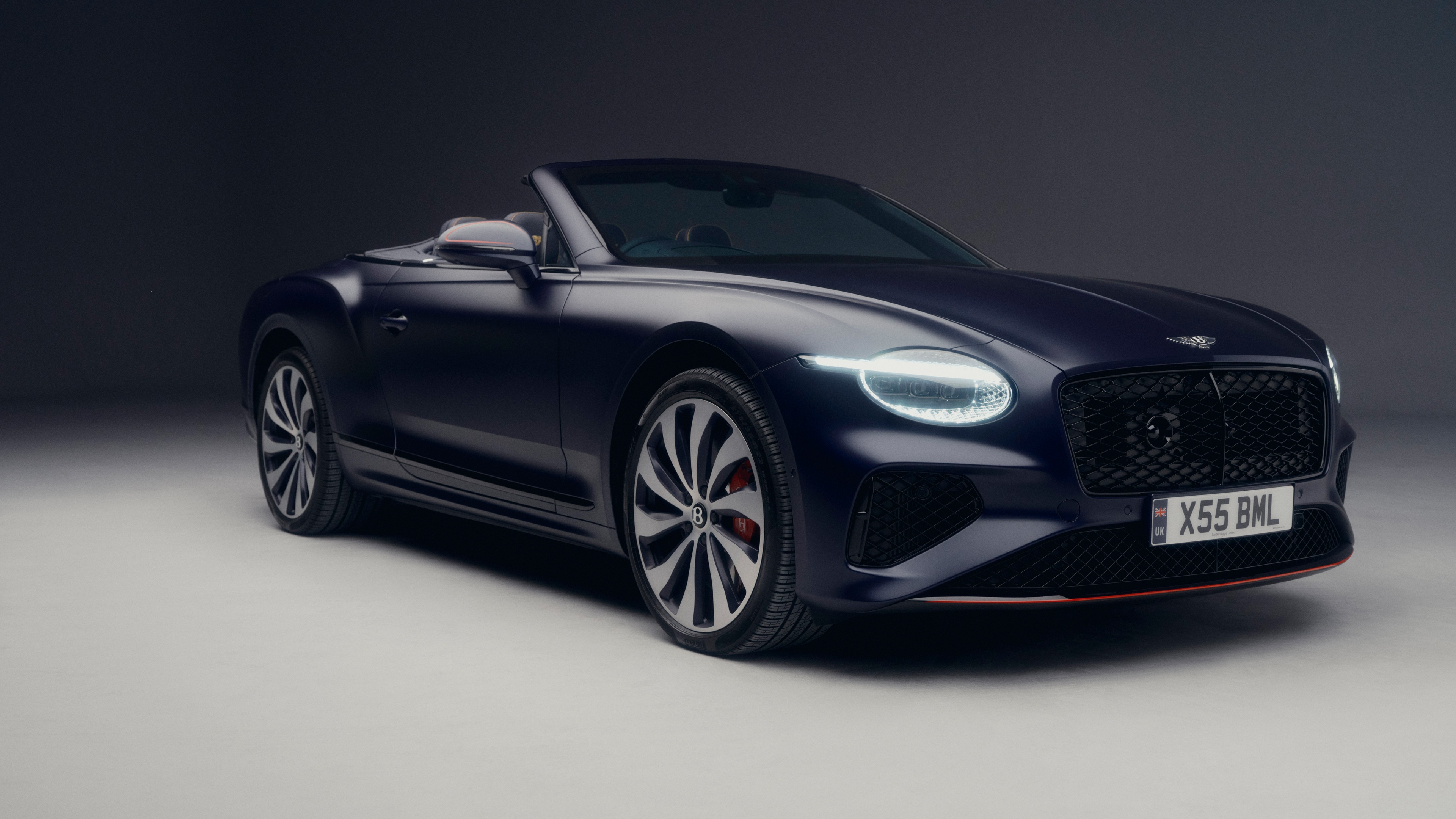 A high-resolution 5K view of a 2026 Bentley Continental GT Convertible, showcasing its premium luxury design and sleek exterior.