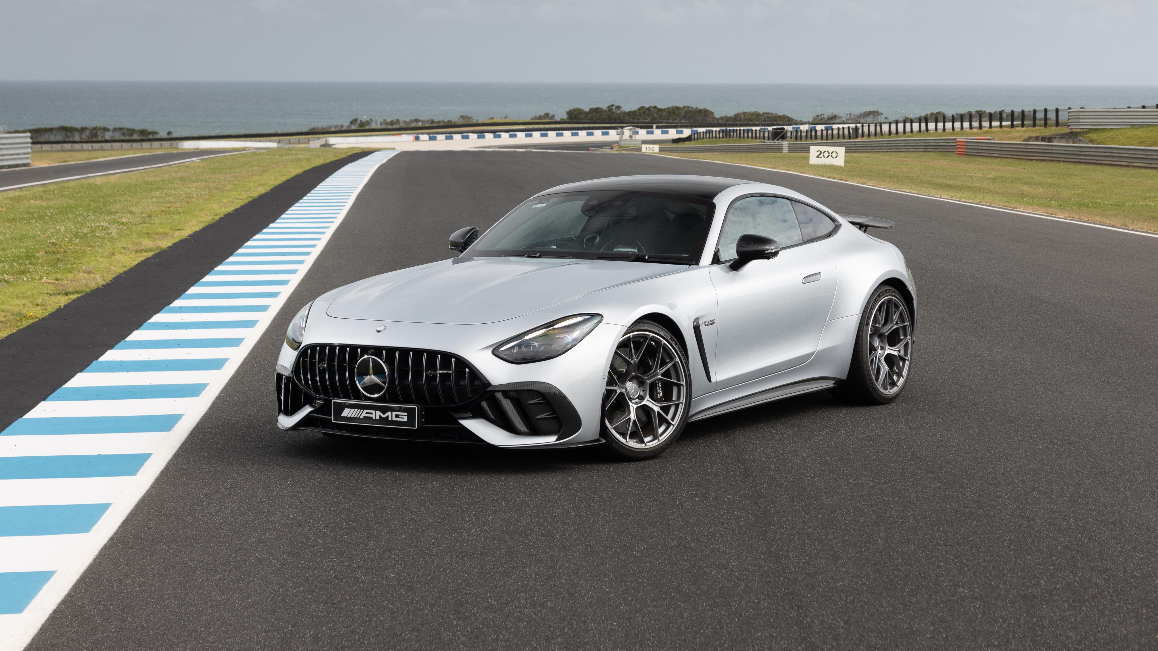 A futuristic 2026 Mercedes-AMG GT 63 PRO 4MATIC+ luxury performance car.
