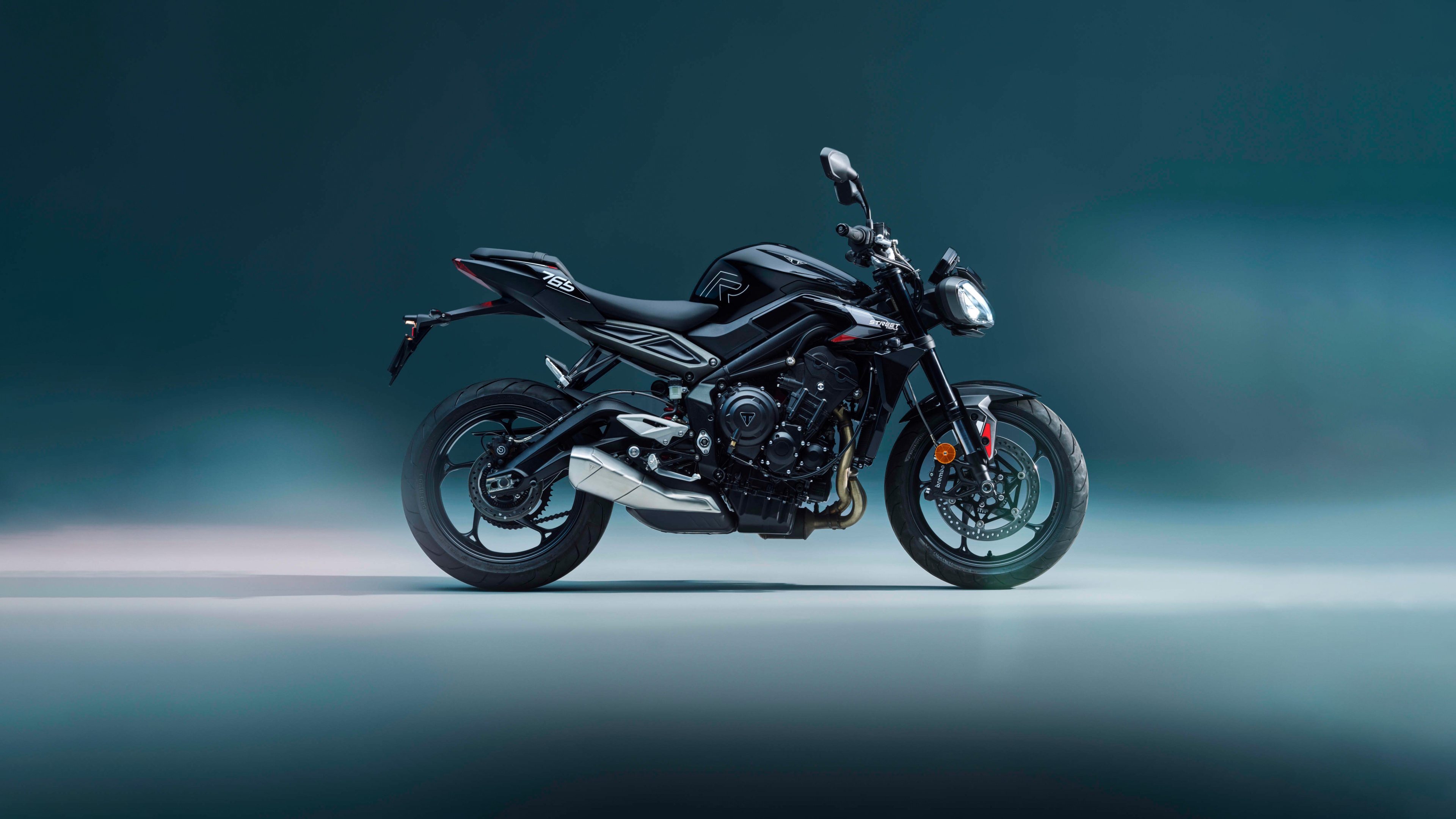 A high-detail, futuristic 2026 Triumph Street Triple R naked sports motorcycle featuring aggressive styling.