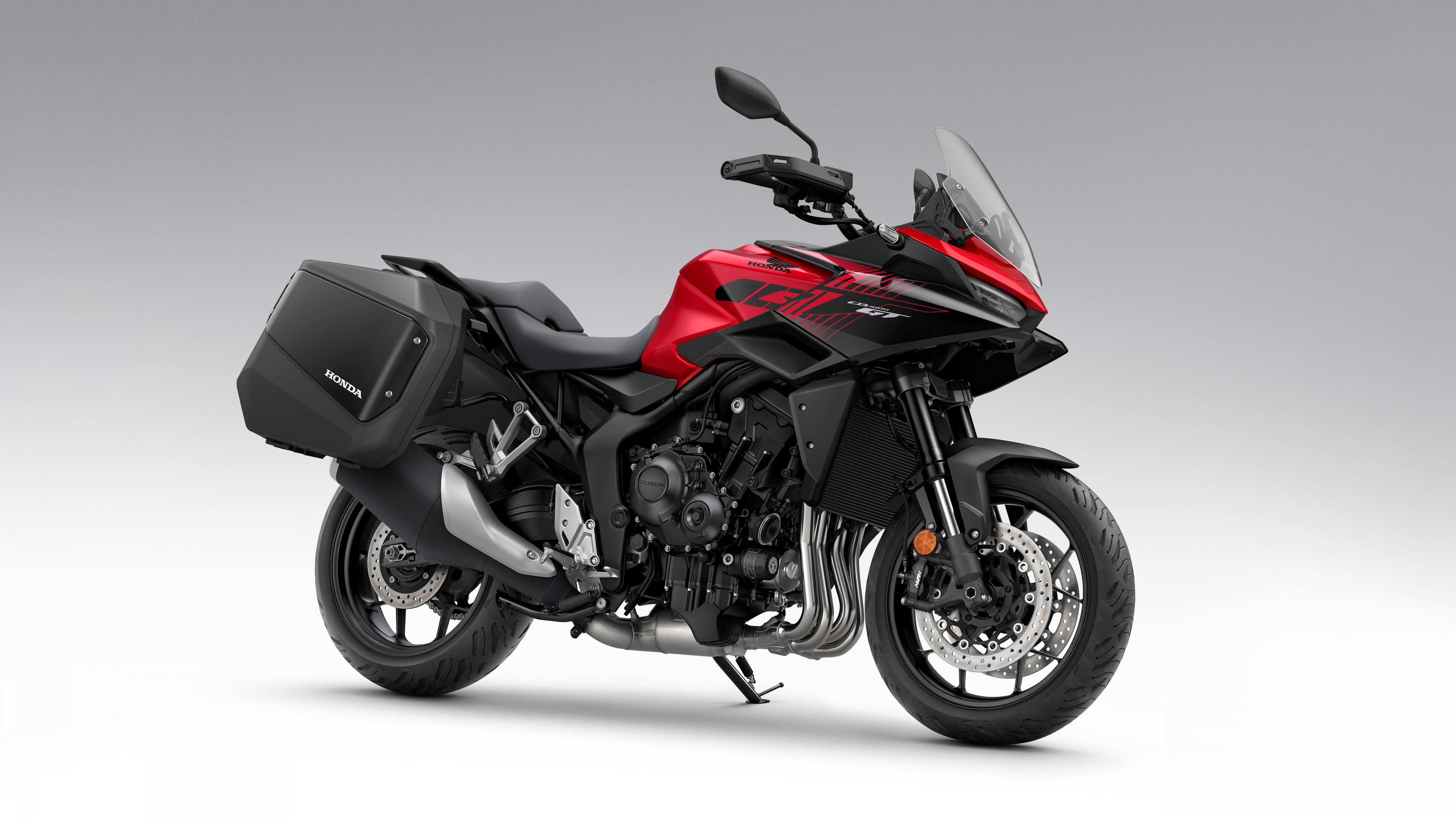 A sleek and aerodynamic 2026 Honda CB1000GT sports motorcycle in high-definition 5K detail.