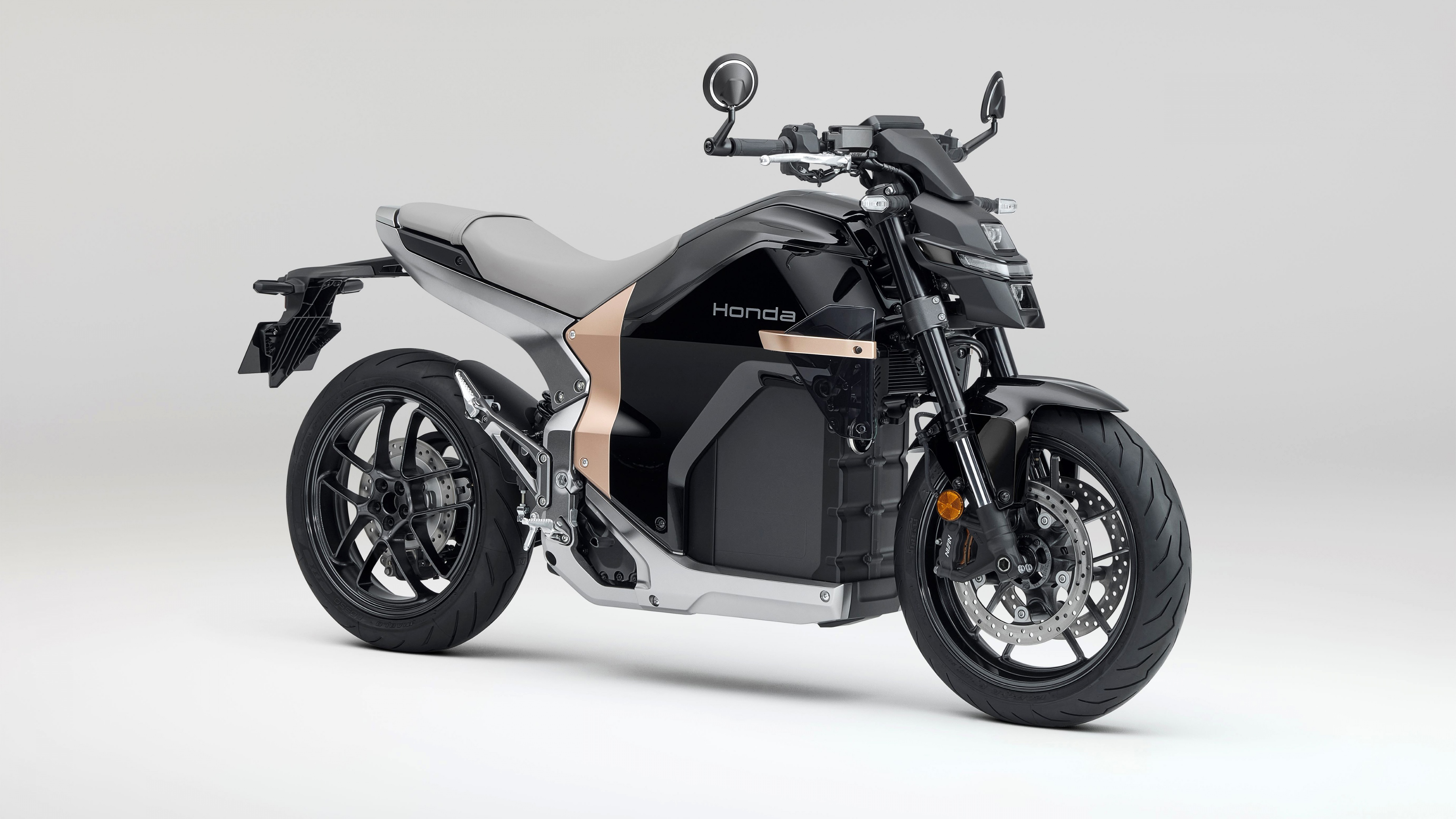 The futuristic Honda WN7 electric motorcycle concept on display at the EICMA Motorcycle Show.