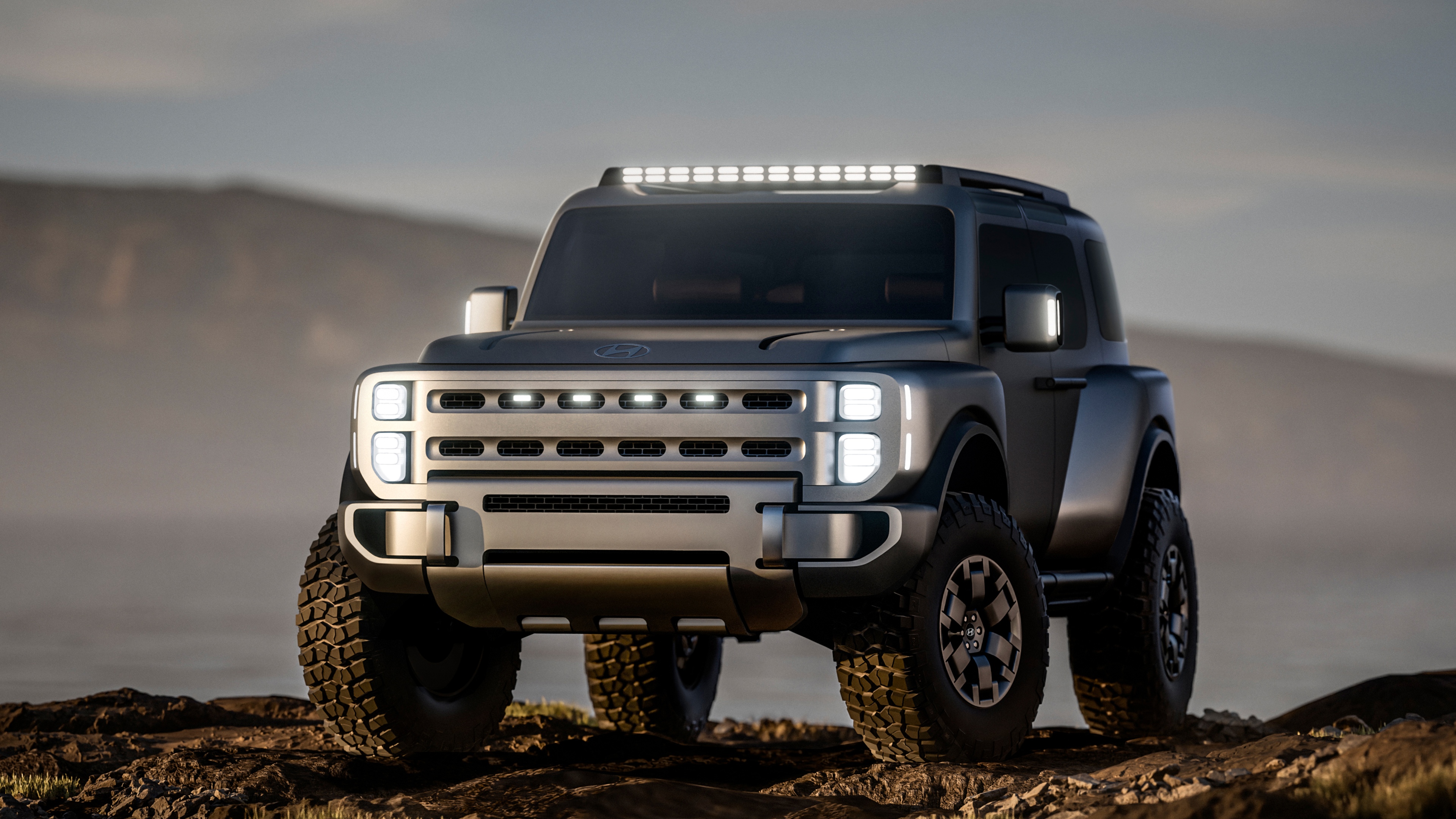 A futuristic Hyundai Boulder Concept electric off-road SUV featuring a rugged, heavy-duty design for extreme terrains.