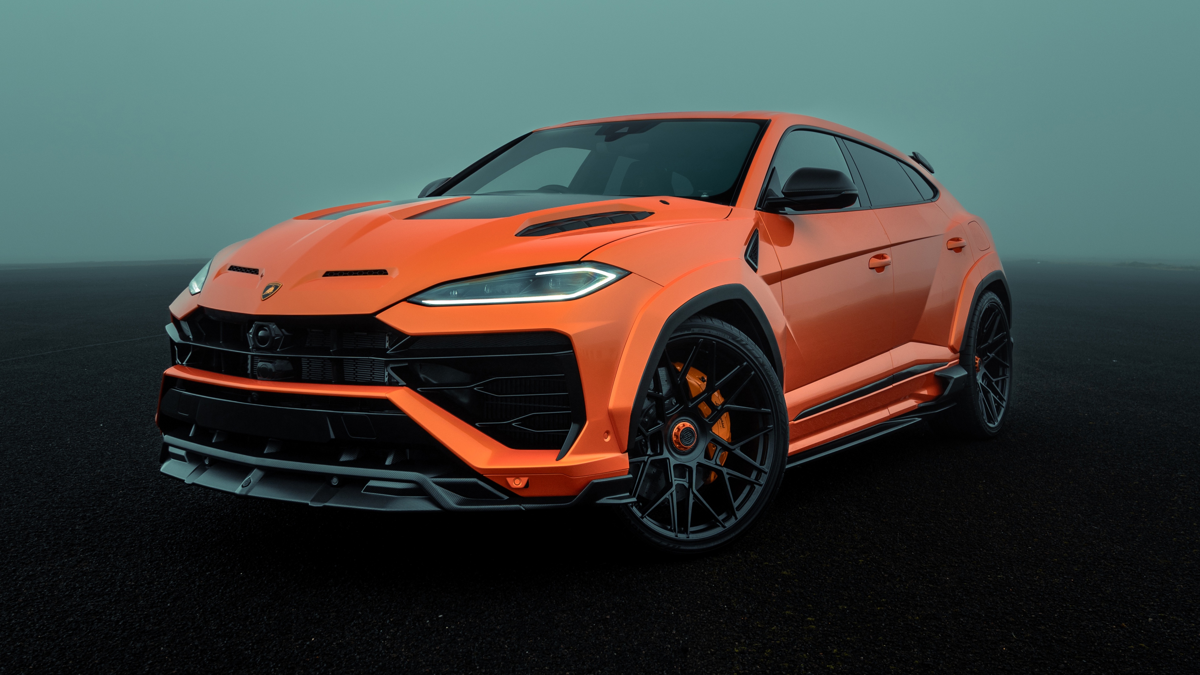 A high-resolution 5K shot of a Lamborghini Urus SE parked in a contemporary urban street setting.