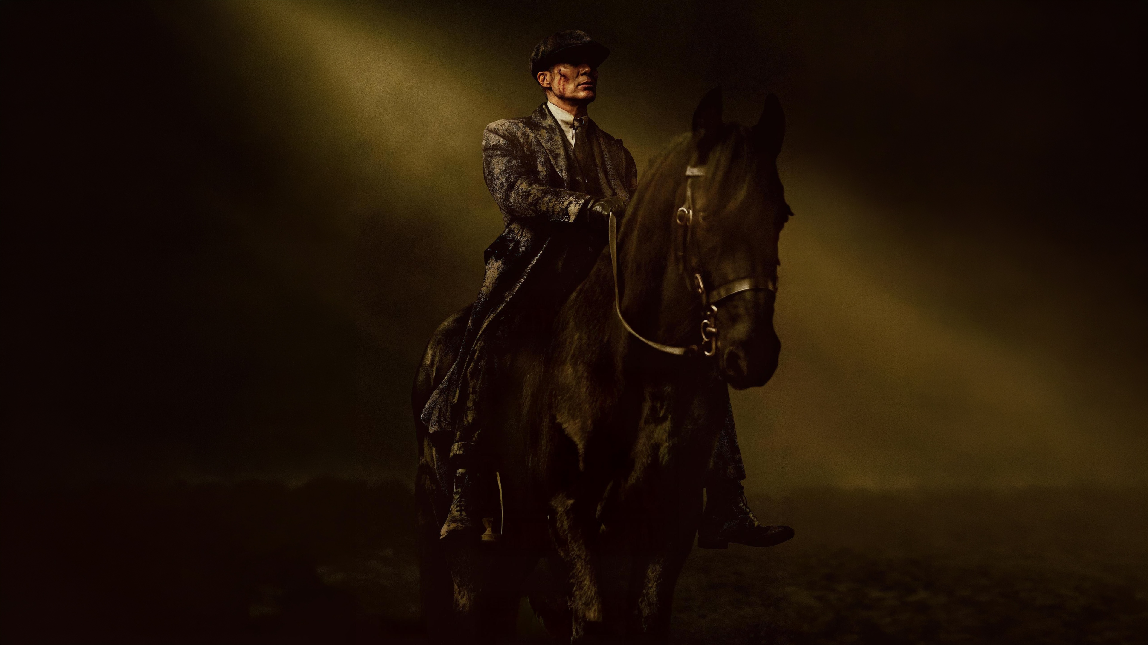 A dark and cinematic close-up of Tommy Shelby, played by Cillian Murphy, from Peaky Blinders: The Immortal Man.
