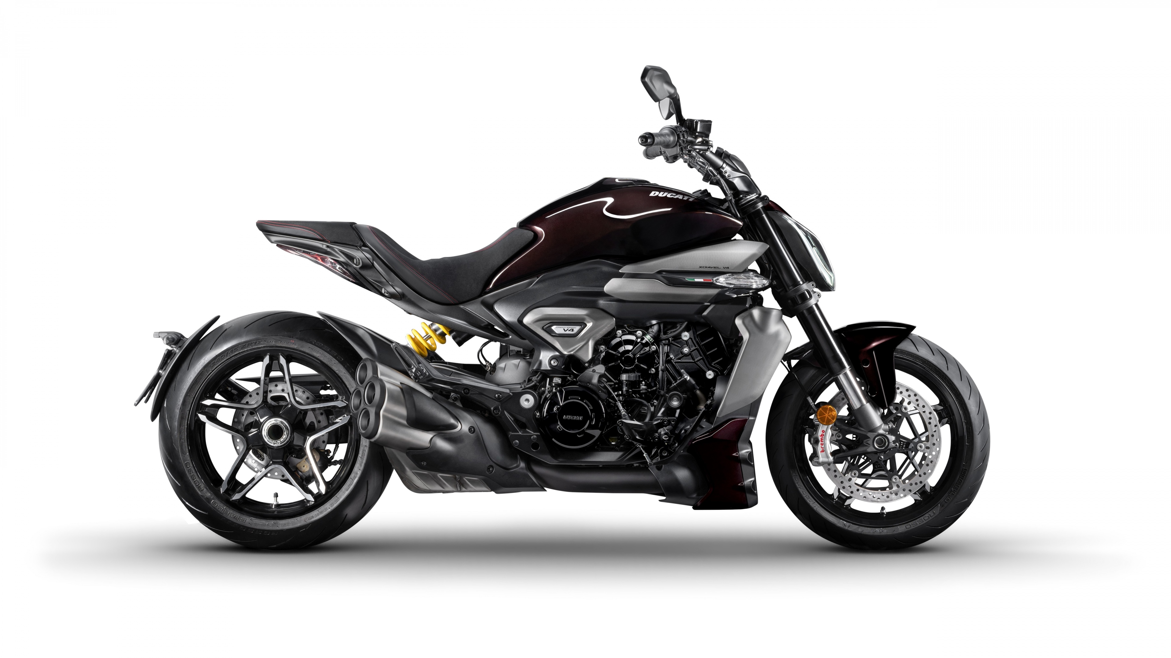 Detailed studio shot of the 2025 Ducati XDiavel V4 motorcycle on a white background