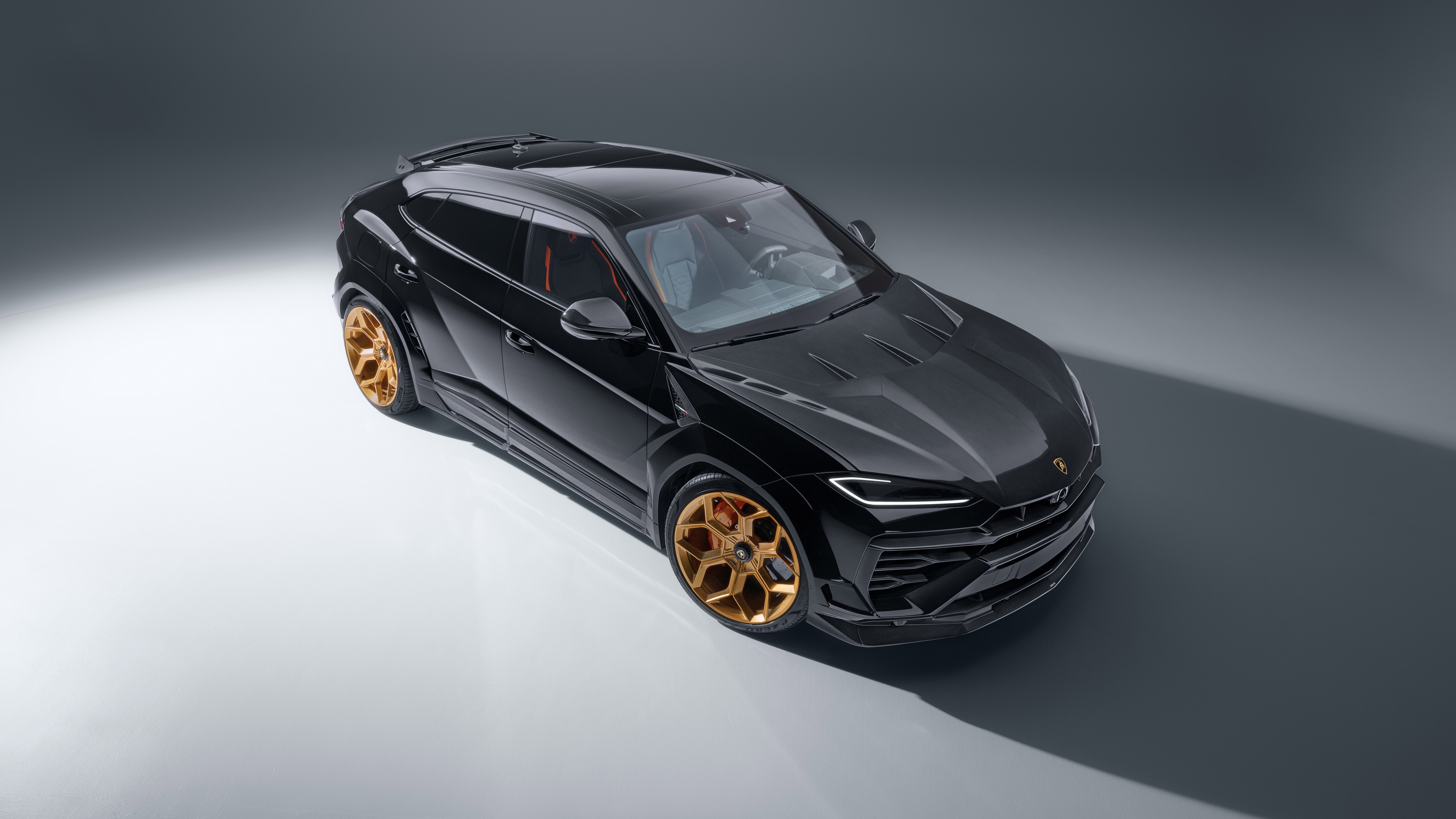 A high-resolution, detailed shot of a 2025 Lamborghini Urus SE with Novitec tuning and custom body kit.