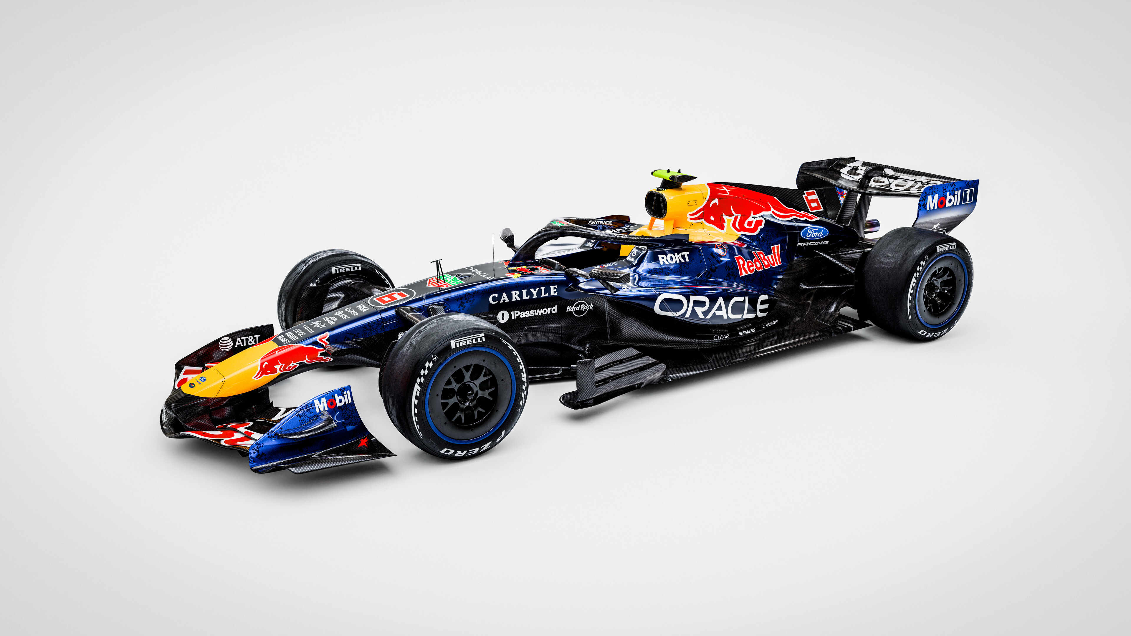 Futuristic 2026 Formula One racing cars isolated on a white background