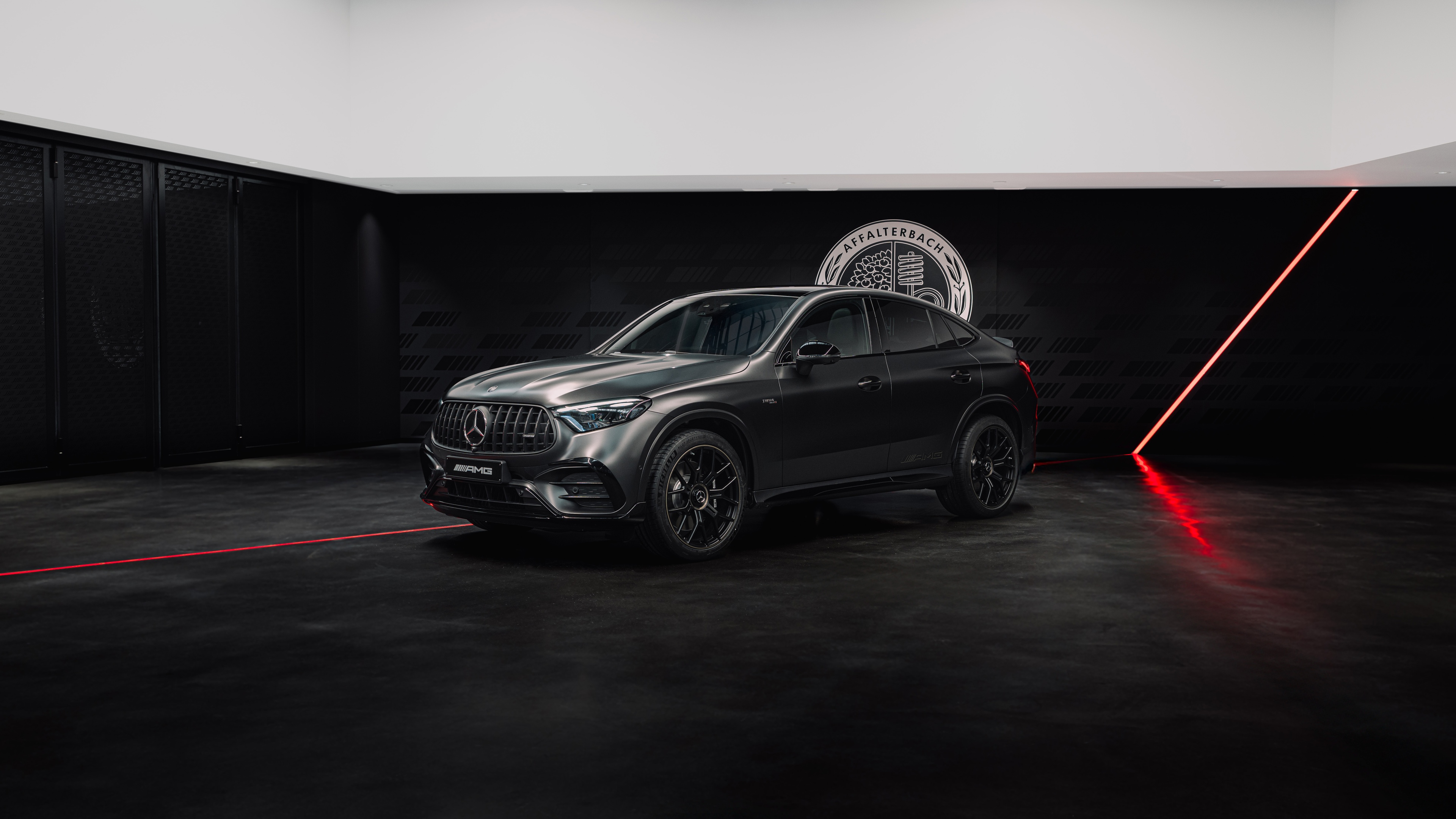 A sleek and futuristic 2026 Mercedes-AMG luxury sports car positioned against a dark, cinematic background.