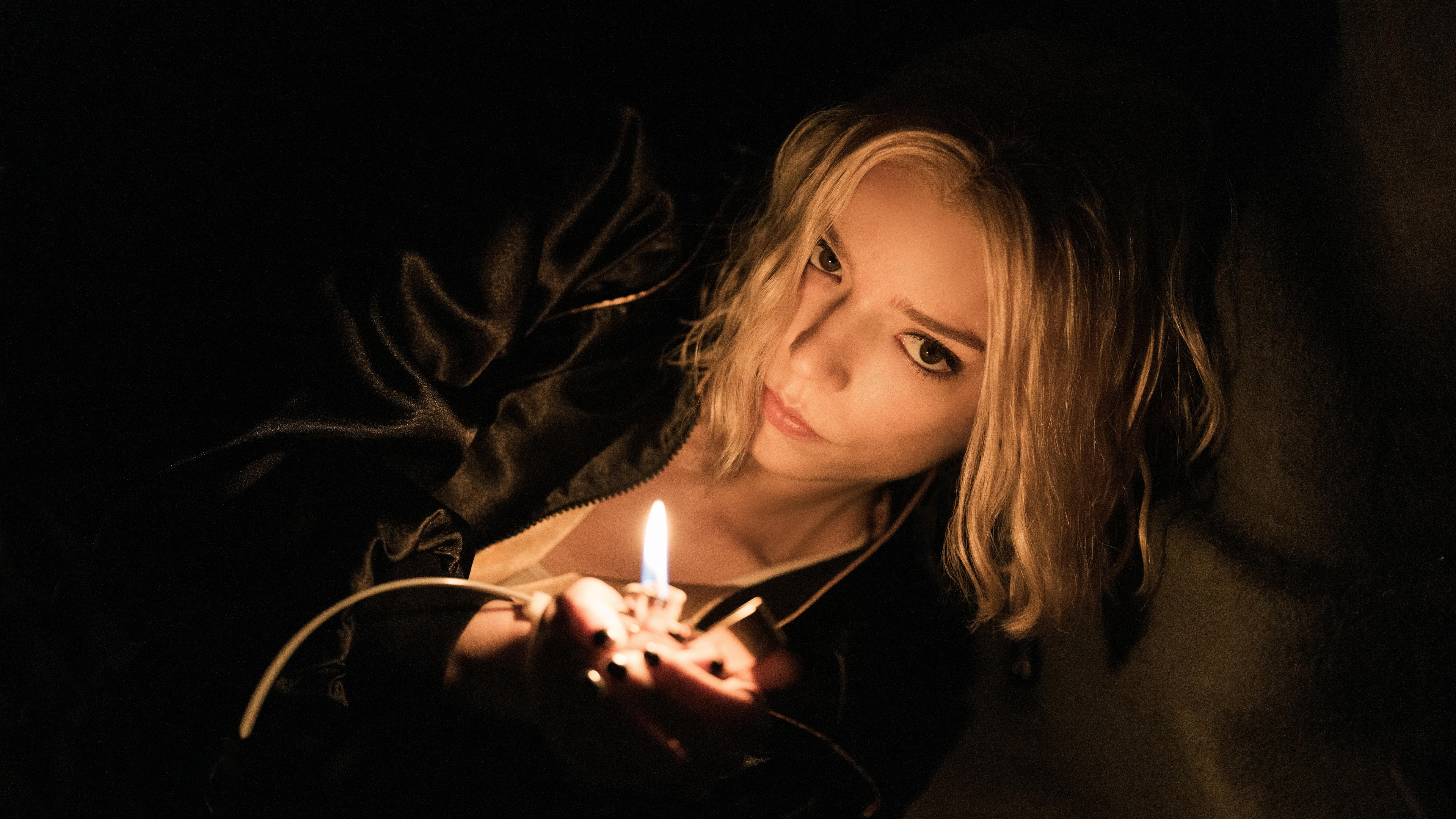 A high-detail, cinematic close-up portrait of Anya Taylor-Joy with sharp focus and professional lighting.