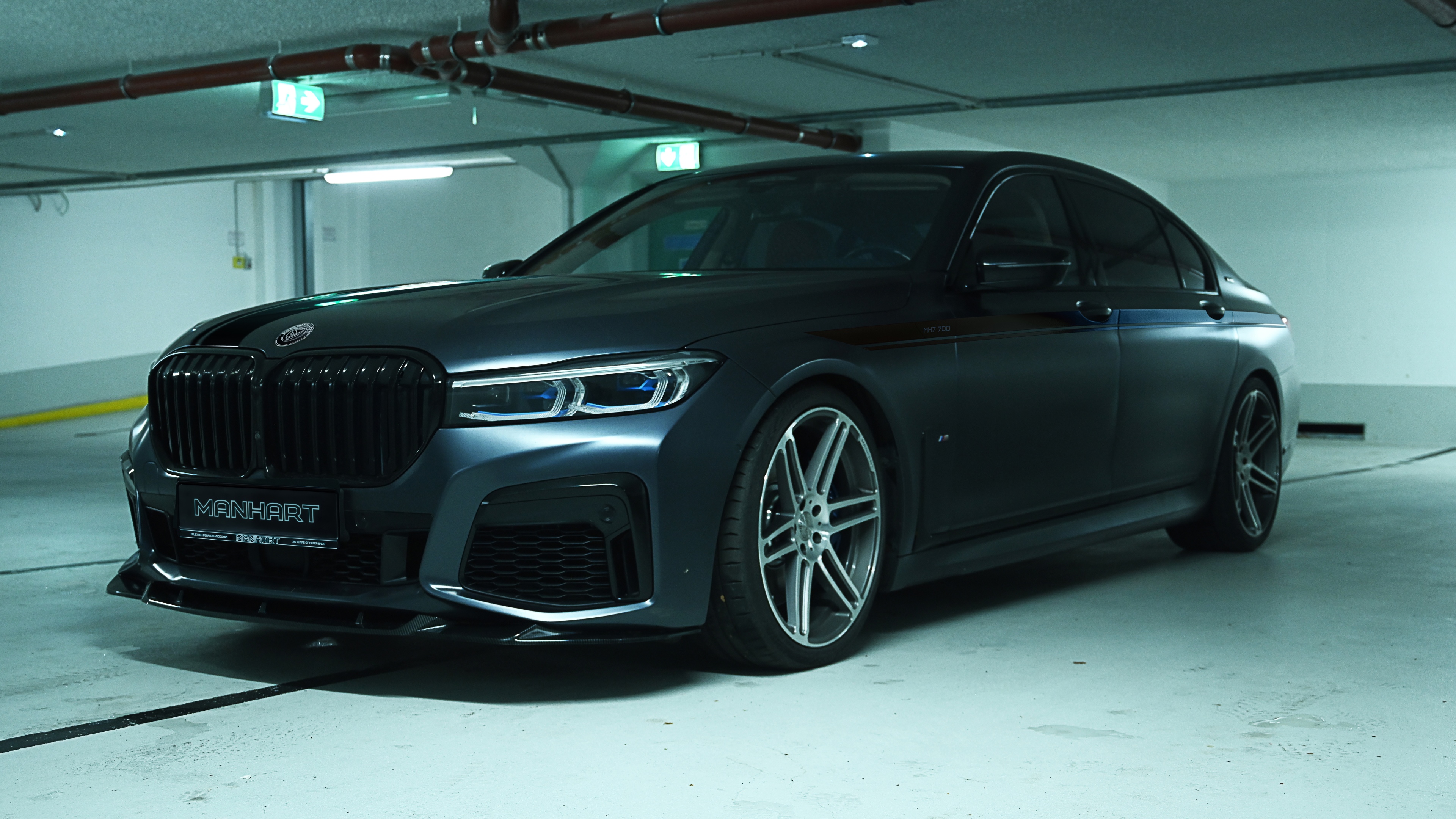 A high-resolution, detailed shot of a BMW 7 Series luxury sedan featuring sleek metallic surfaces and premium automotive design.