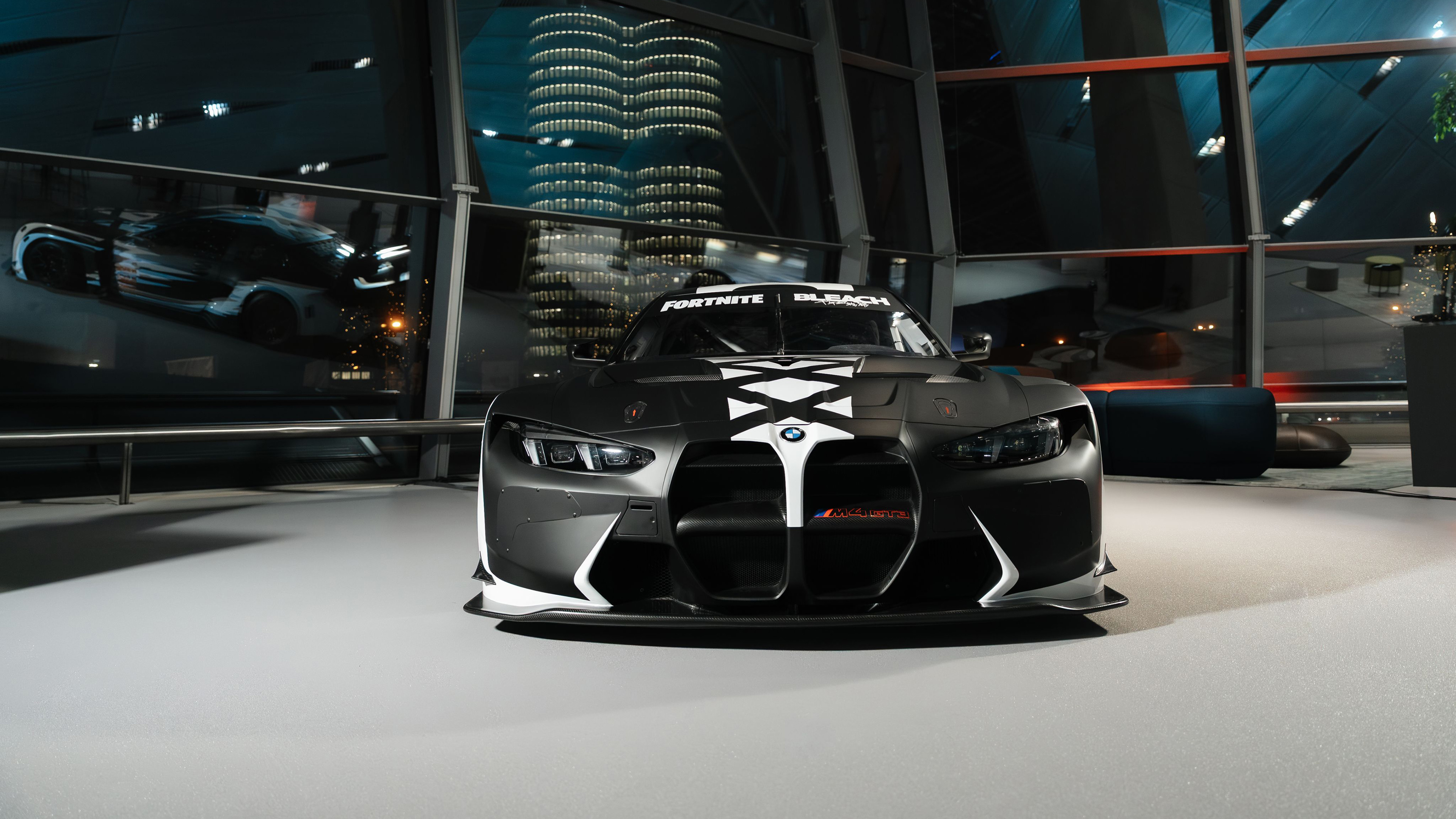 A BMW M4 GT3 EVO race car designed in the colorful art style of Fortnite.