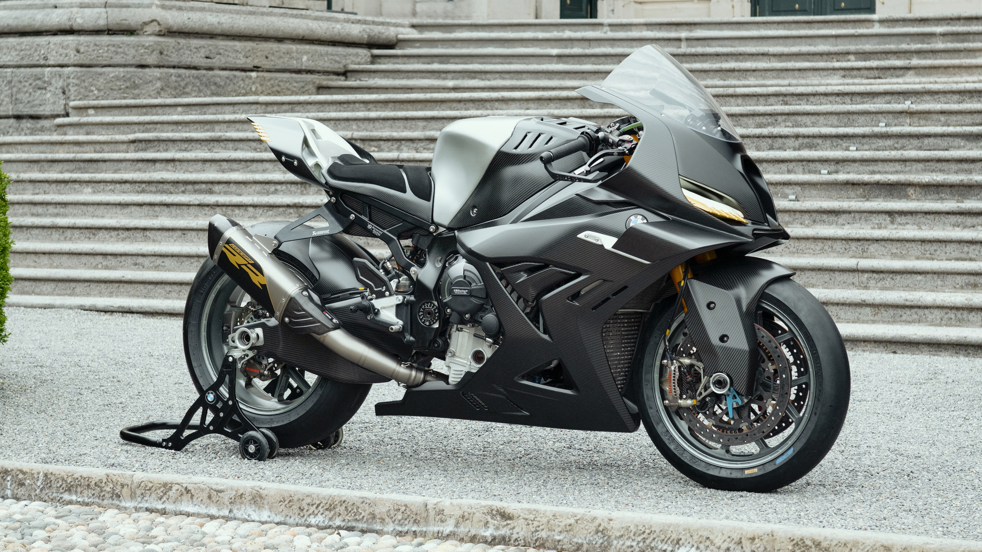 A futuristic BMW Motorrad Concept RR sports motorcycle showcasing sleek aerodynamic lines and advanced technology.