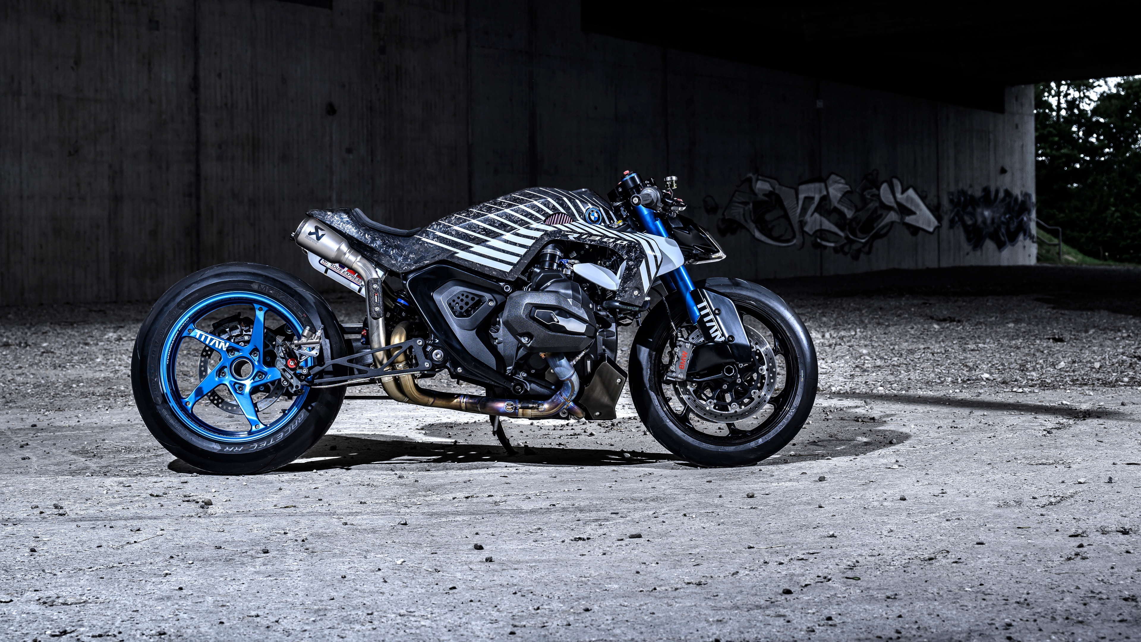 High-detail view of a custom BMW R 1300 R Titan motorcycle with a sleek metallic finish and futuristic design.