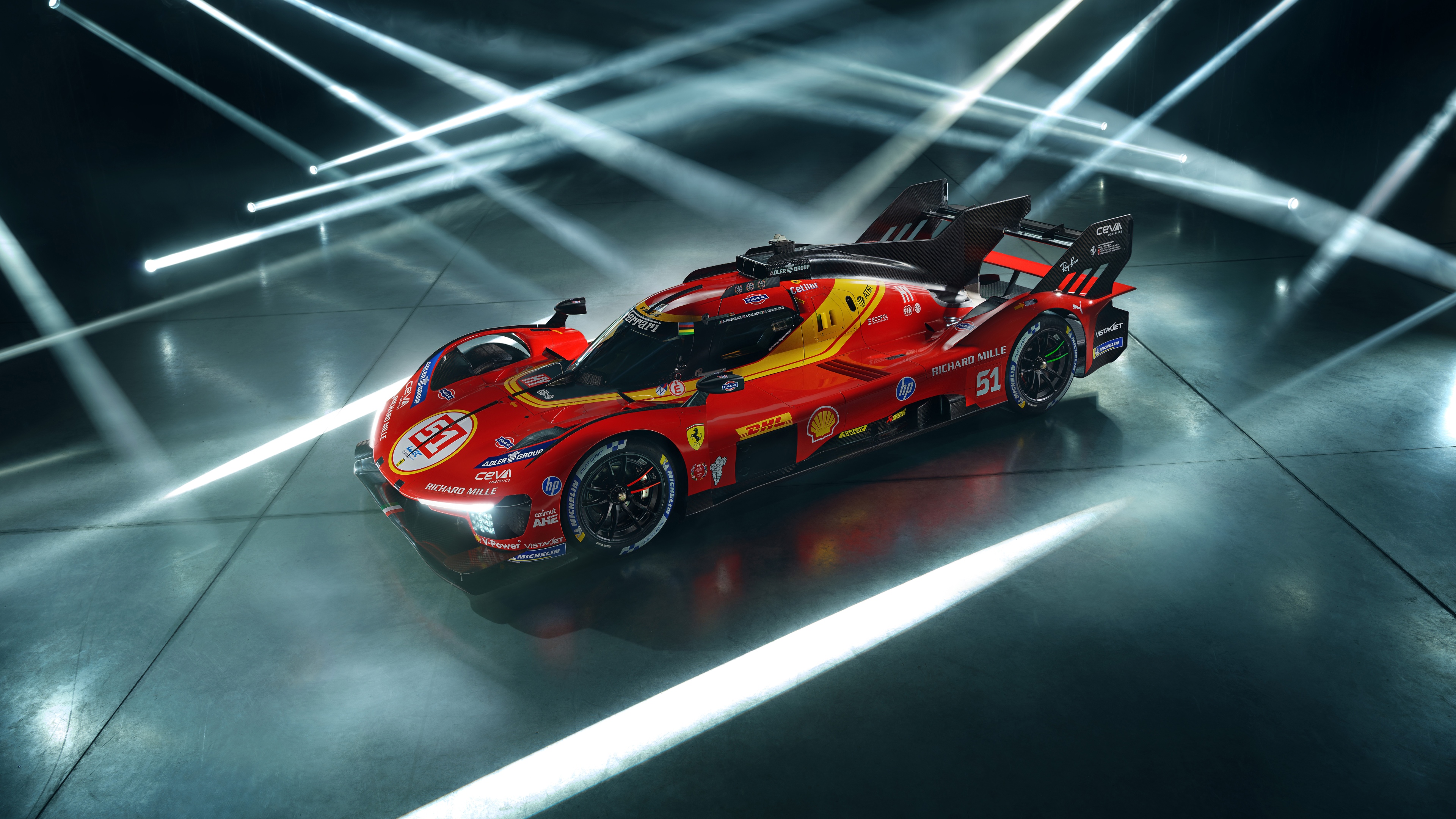 Cinematic shot of the Ferrari 499P Le Mans Hypercar under dramatic studio lighting, highlighting its aerodynamic silhouette.