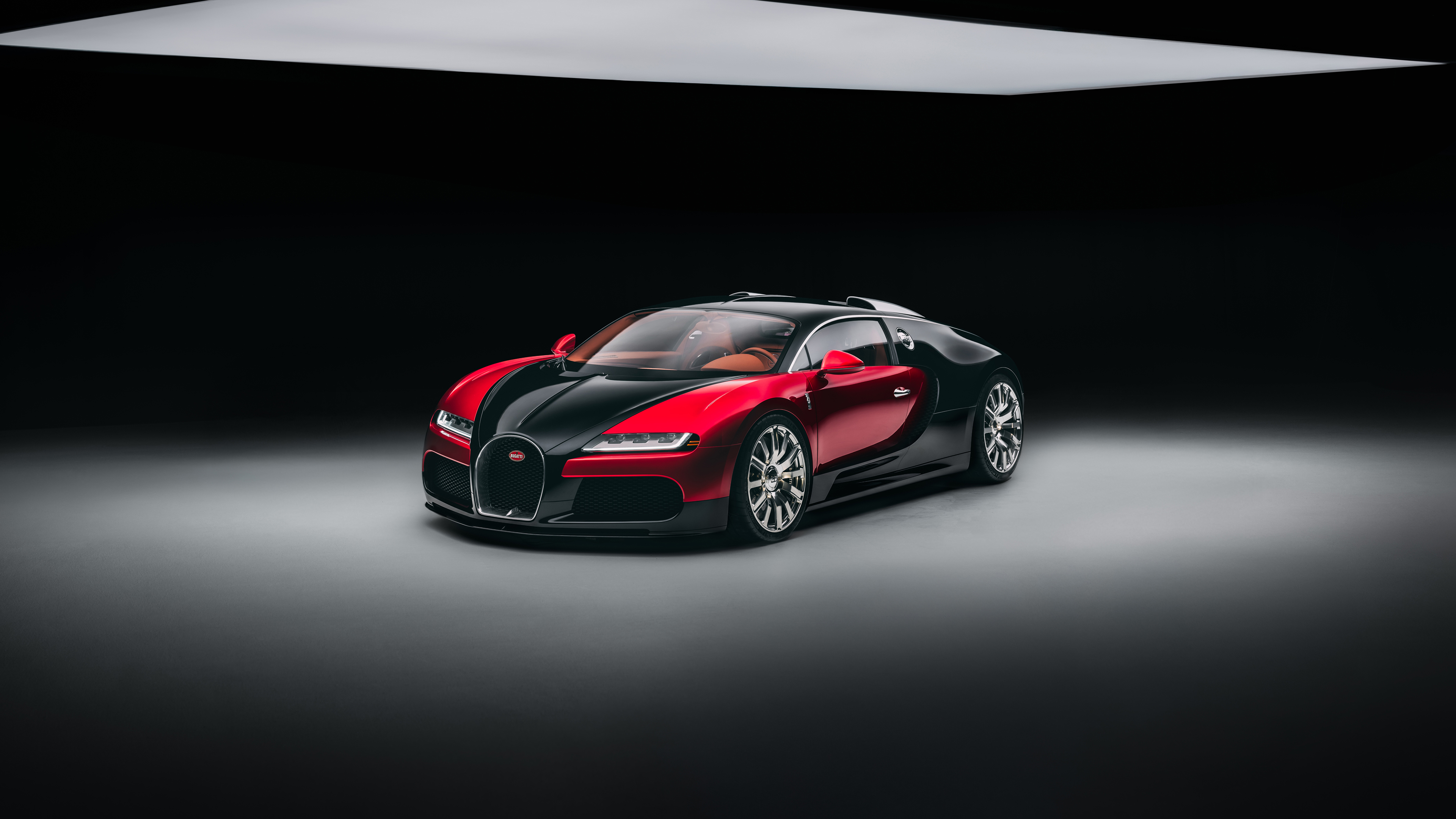 A sleek and futuristic 2026 Bugatti Veyron hypercar prototype positioned against a deep, dark background.