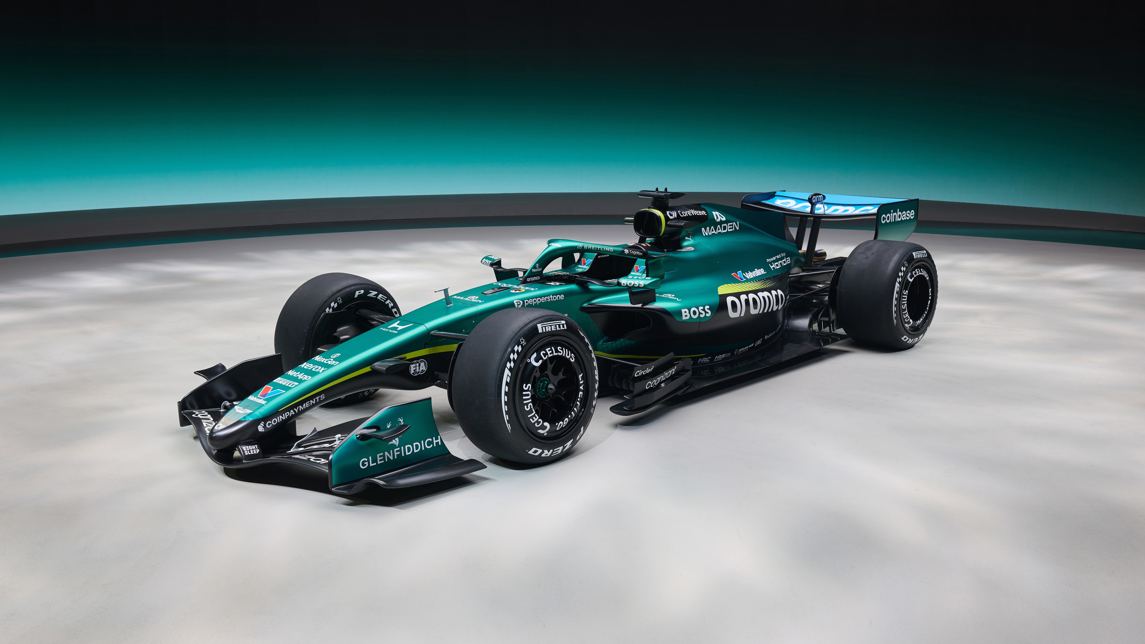 Close-up view of futuristic 2026 Formula One racing cars showcasing advanced aerodynamic design and sleek carbon fiber textures.