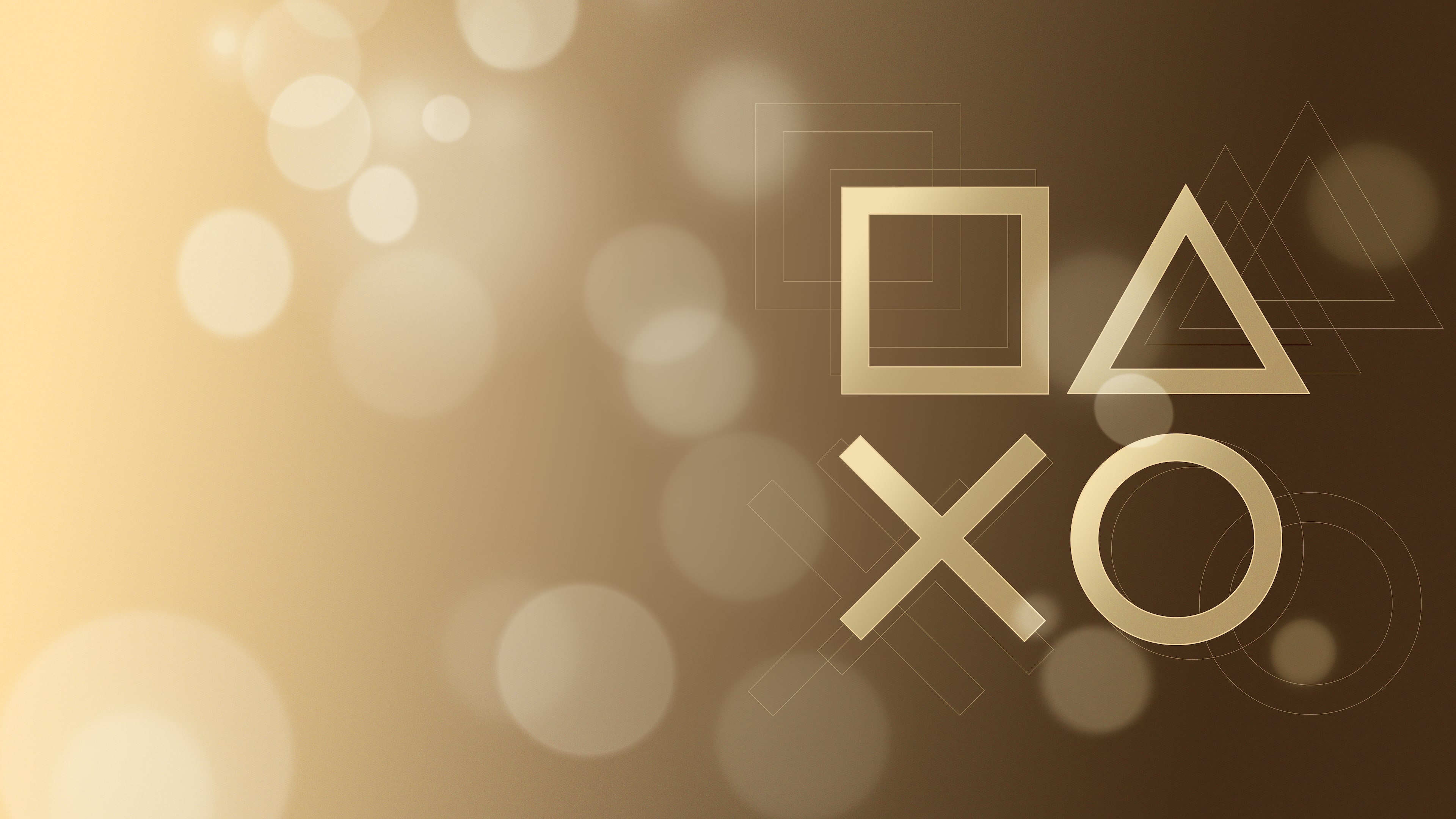 A luxurious golden PlayStation controller featuring iconic symbols on a shimmering golden background.