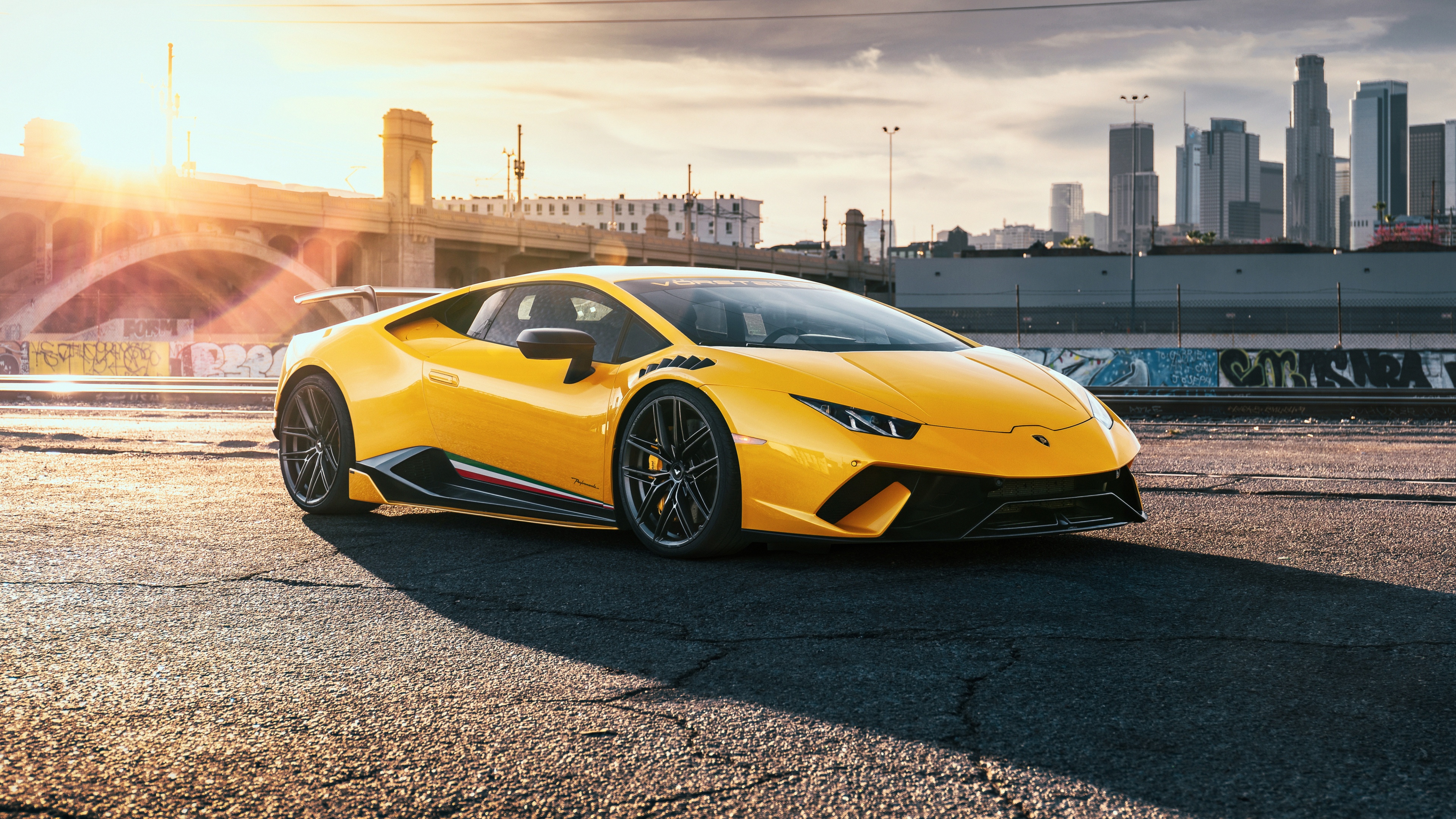 A group of high-performance yellow cars captured in stunning 5K detail.