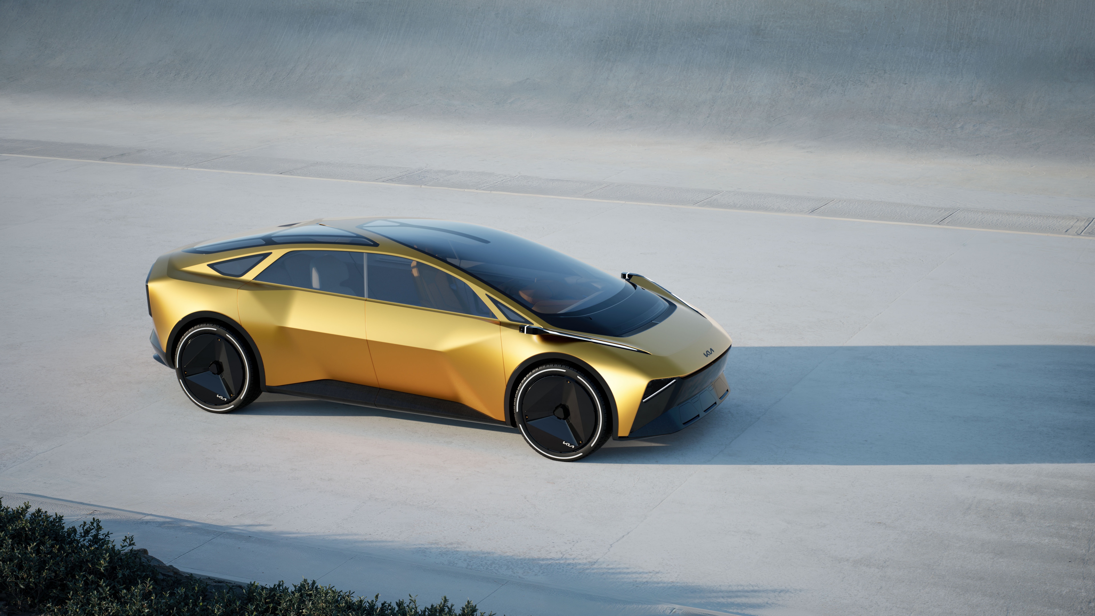 A futuristic Kia Vision Meta Turismo concept car featuring aerodynamic sculpting and a high-tech metallic exterior.