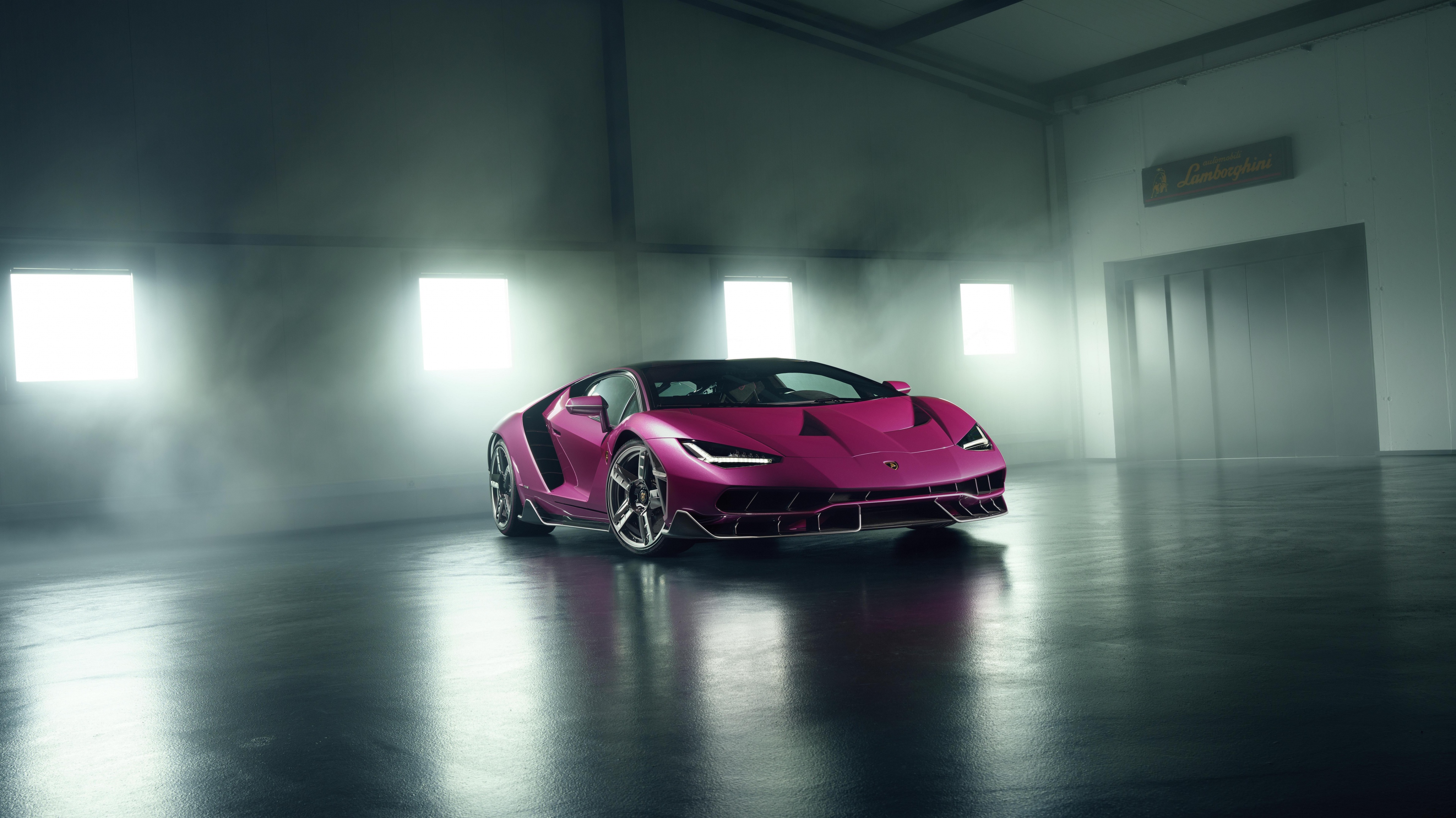 A high-detail shot of the Lamborghini Centenario parked inside a luxury garage as part of the Albert Spiess Collection.
