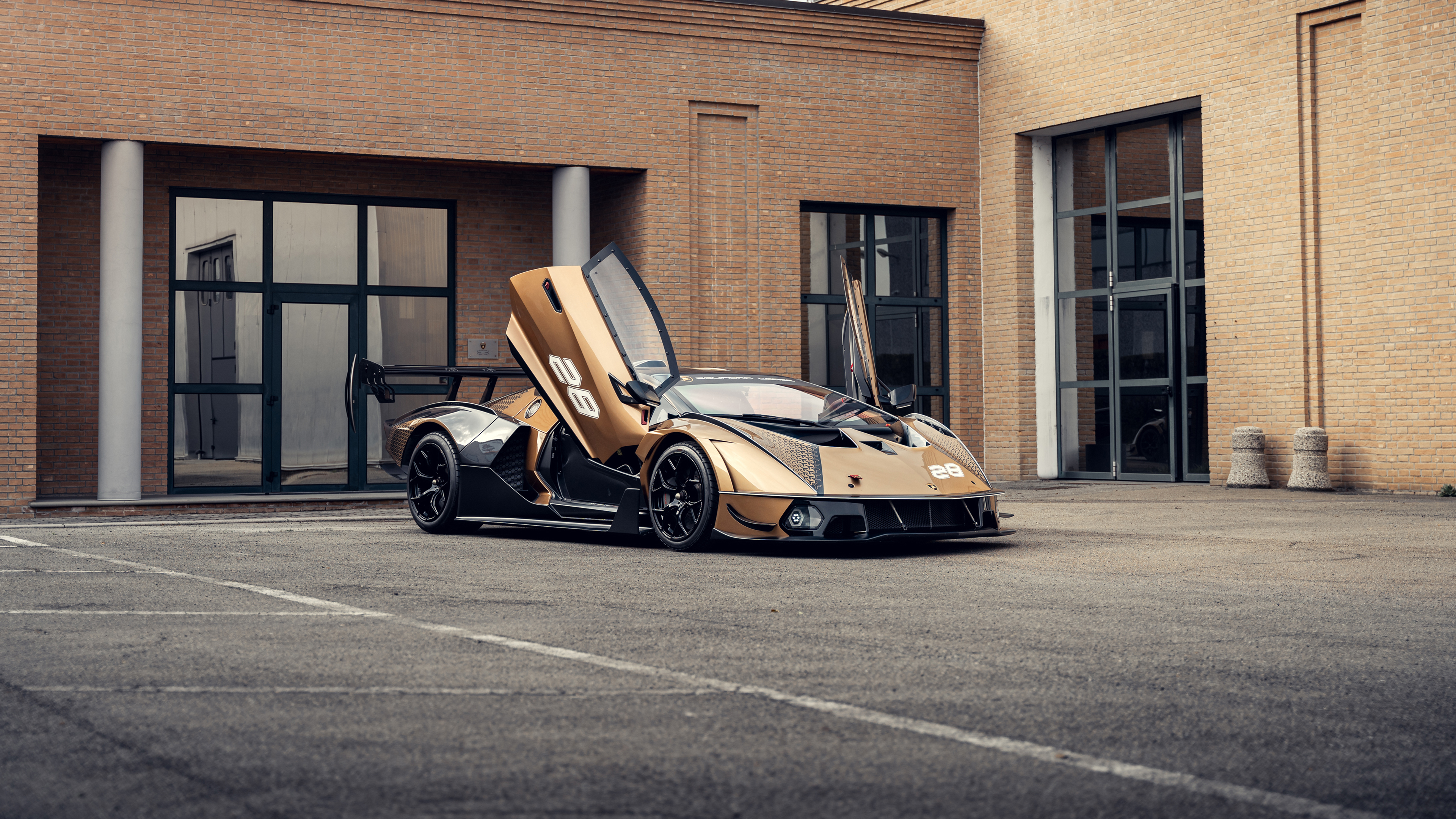 A high-performance Lamborghini Essenza SCV12 hypercar featuring aggressive aerodynamic bodywork and racing aesthetics.
