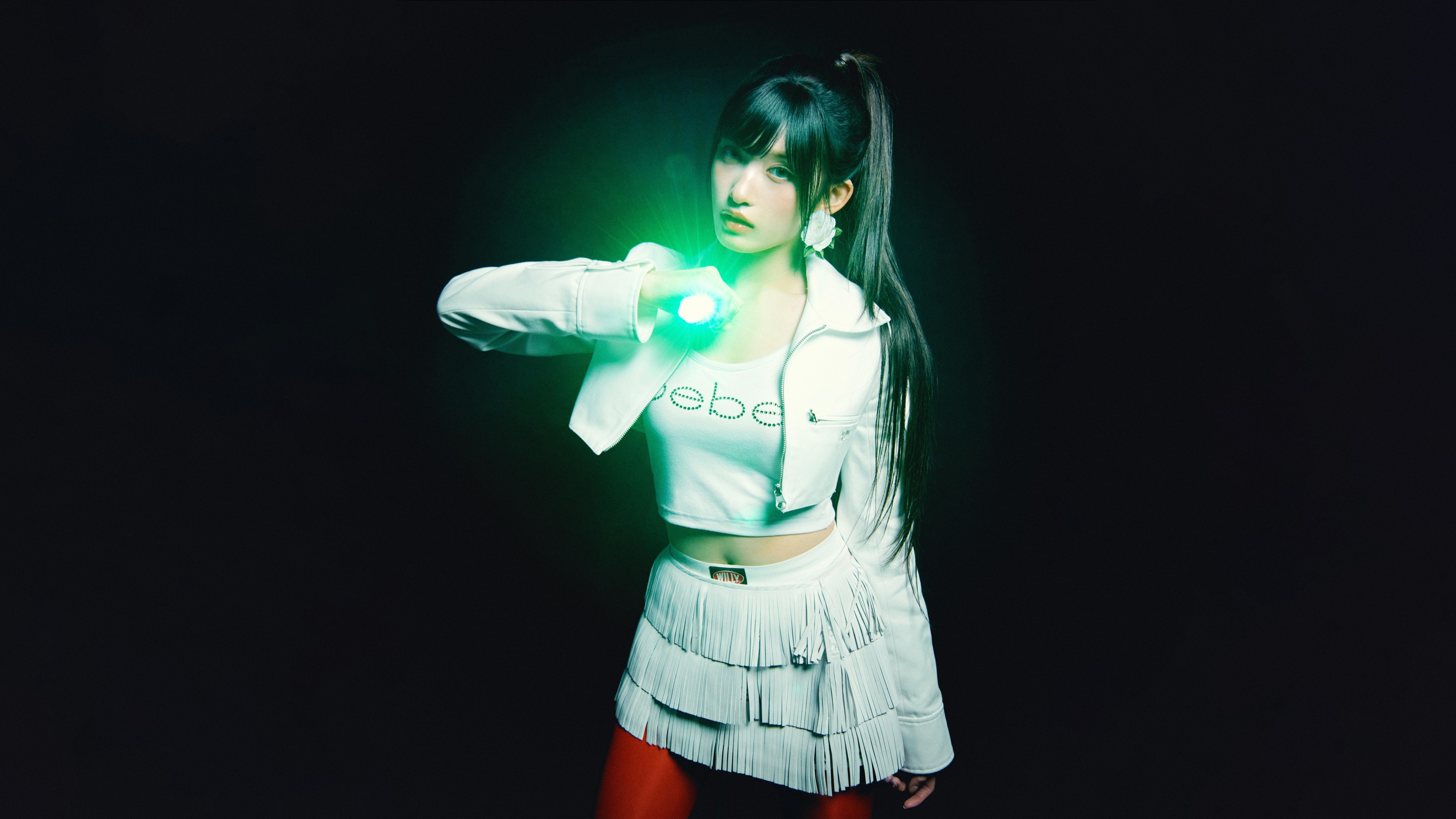 A high-resolution, dramatic portrait of Leeseo from the K-pop group IVE against a dark, moody background.