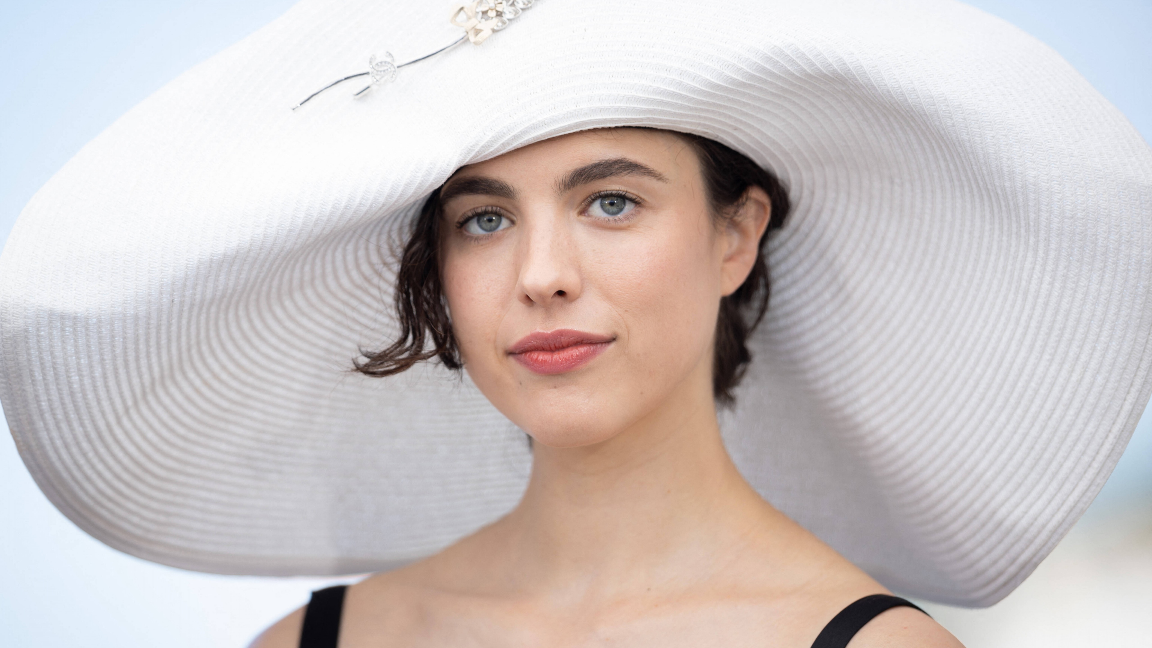 American actress Margaret Qualley posing elegantly at the Cannes Film Festival 2026.