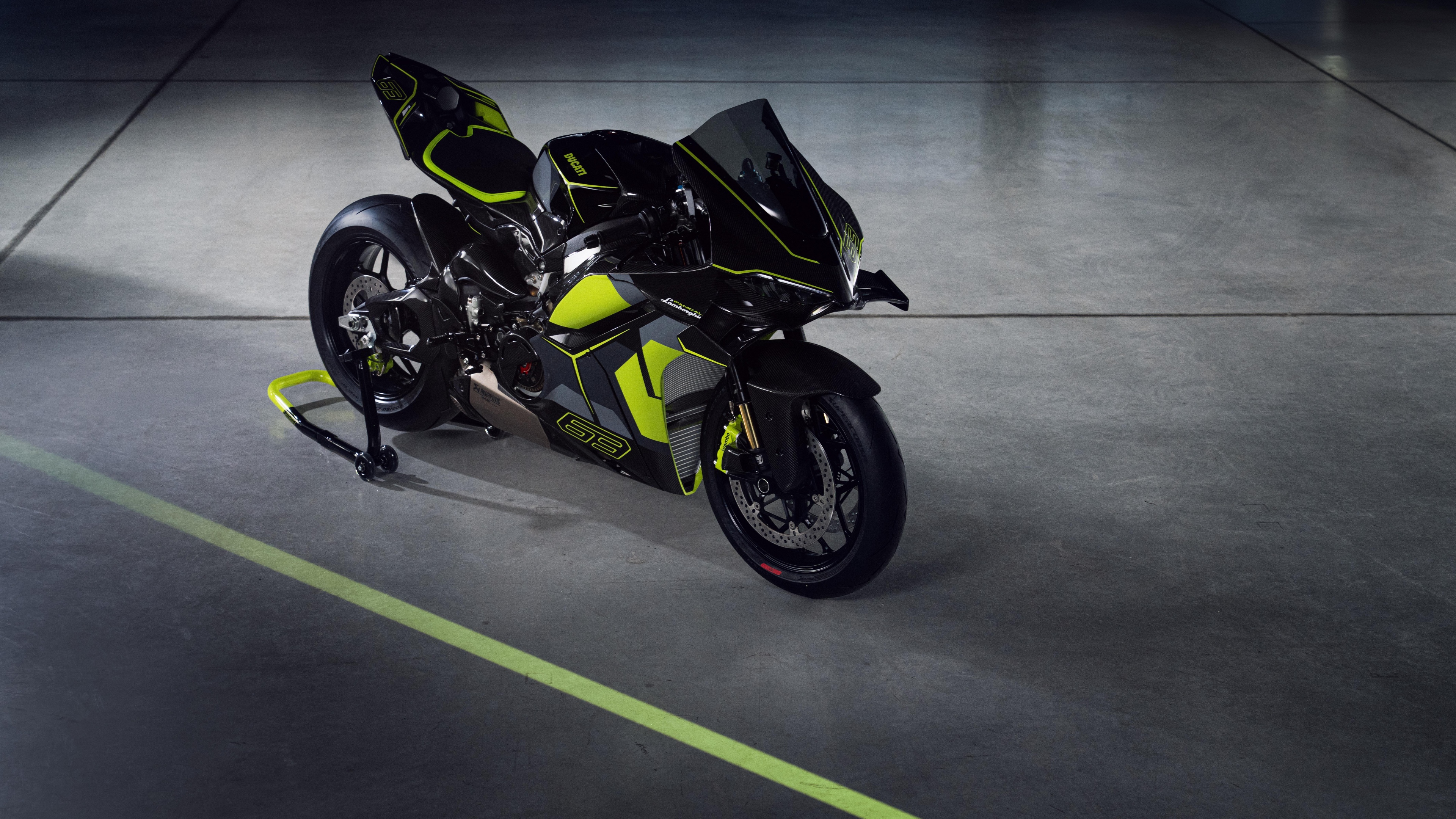A Lamborghini supercar and a Ducati Panigale V4 motorcycle captured in a dark, high-contrast cinematic setting.