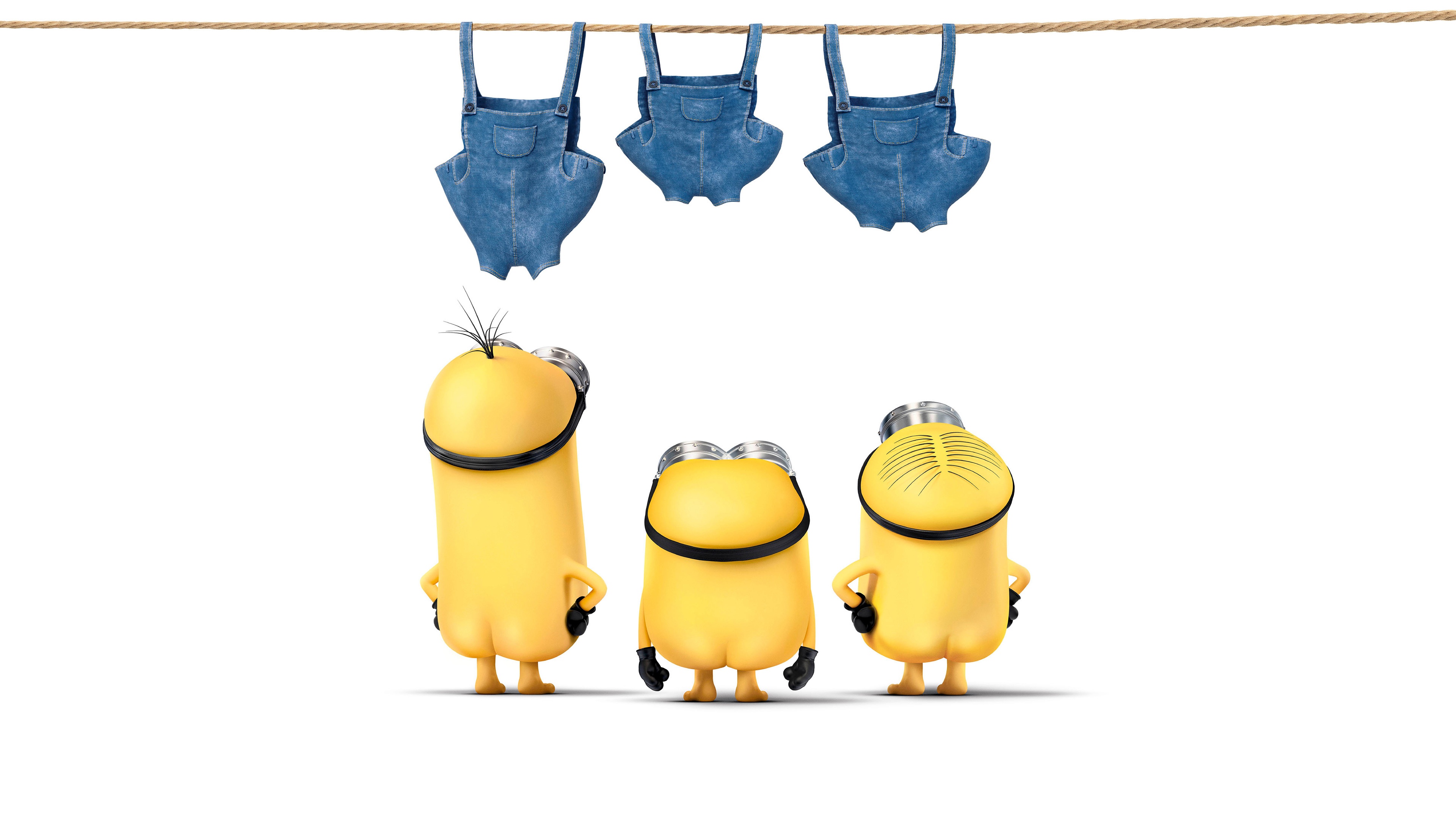 A collection of funny yellow Minions from the Despicable Me movie series on a white background.