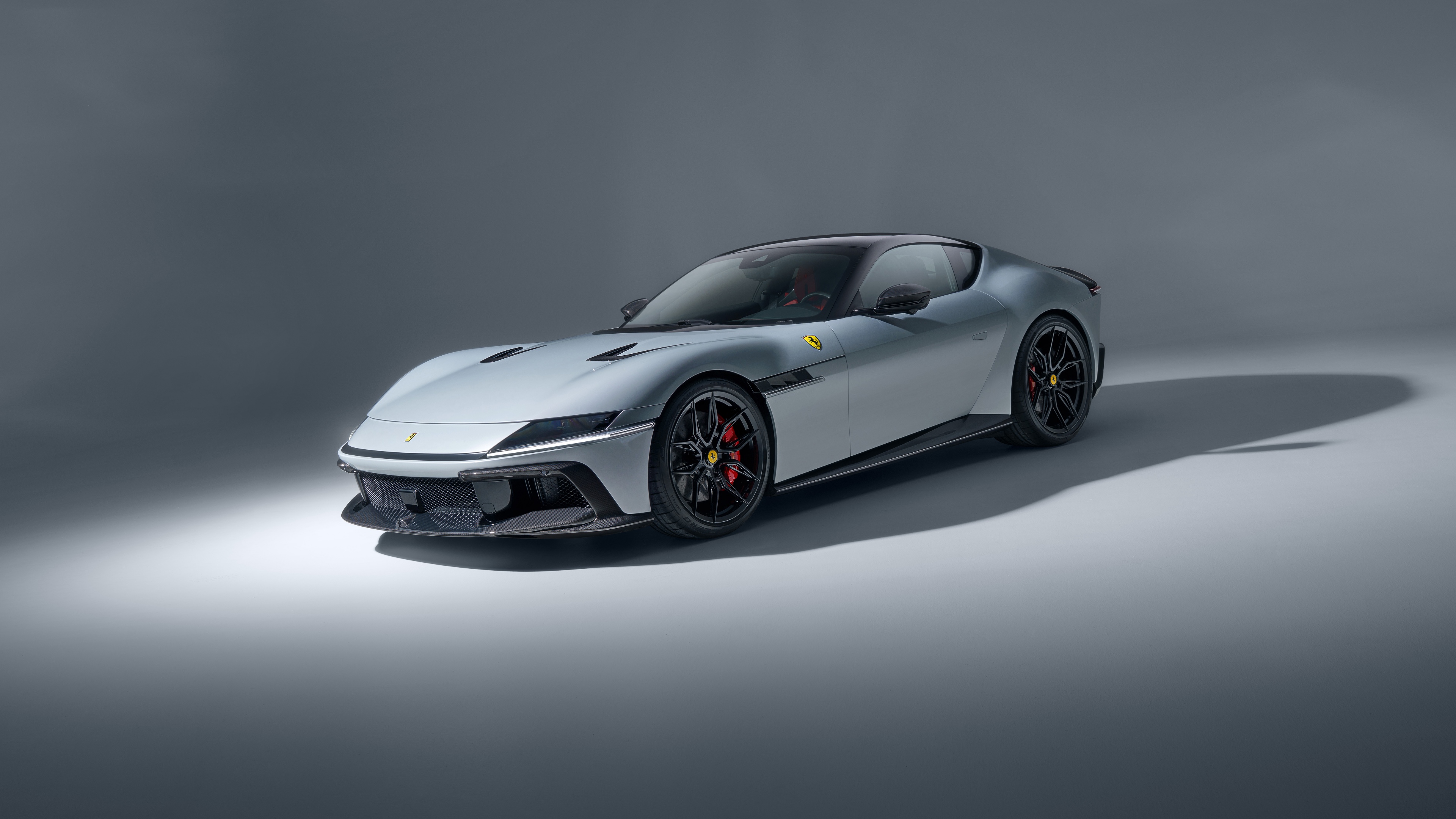 A close-up, high-detail shot of a Novitec tuned Ferrari 12Cilindri supercar featuring premium aerodynamic modifications.
