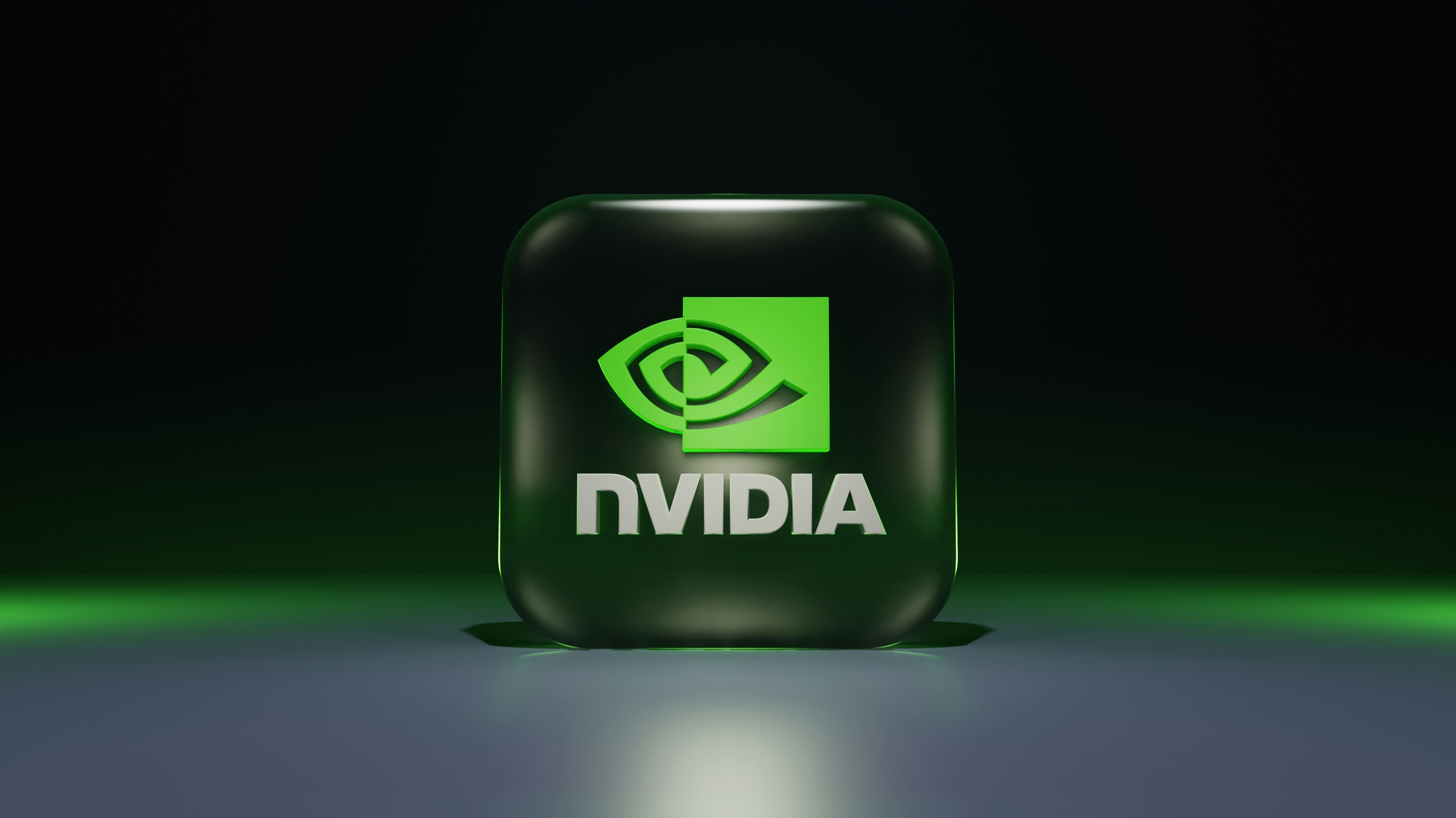 Nvidia logo in green color on a dark, atmospheric background